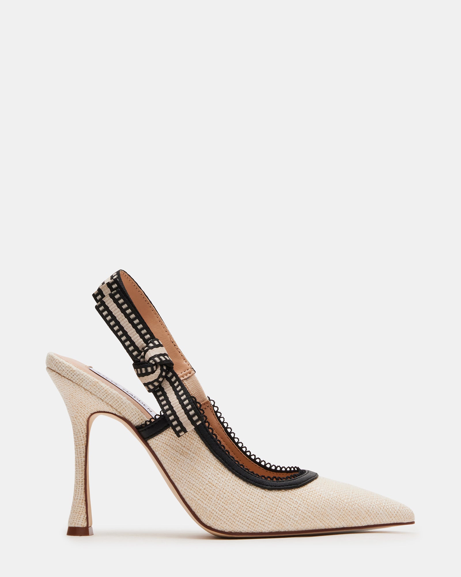 Side view of nude slingback heels showing the grosgrain bow and stiletto heel