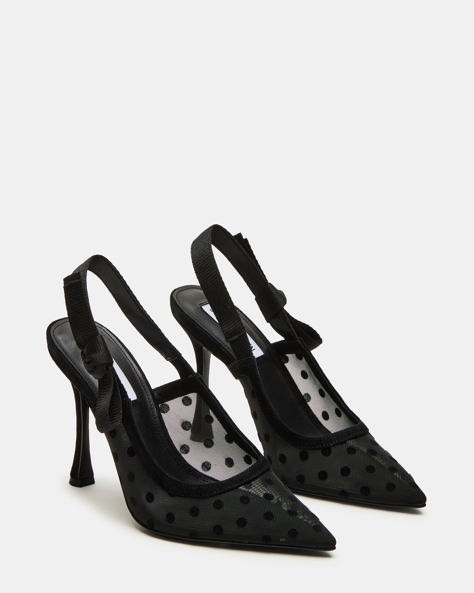Close-up of the grosgrain ribbon and bow detail on the slingback strap