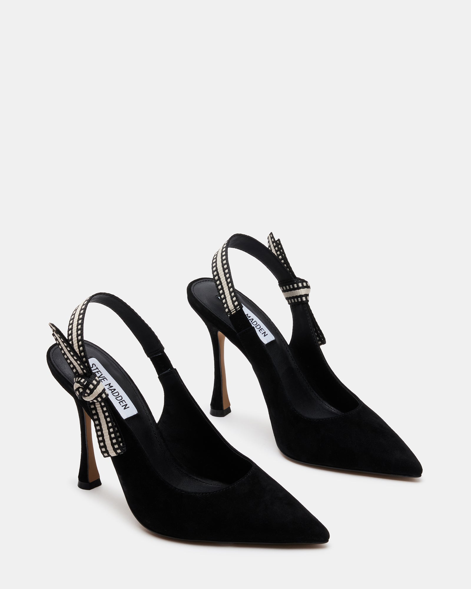 Close-up of grosgrain ribbon bow detail on slingback strap.