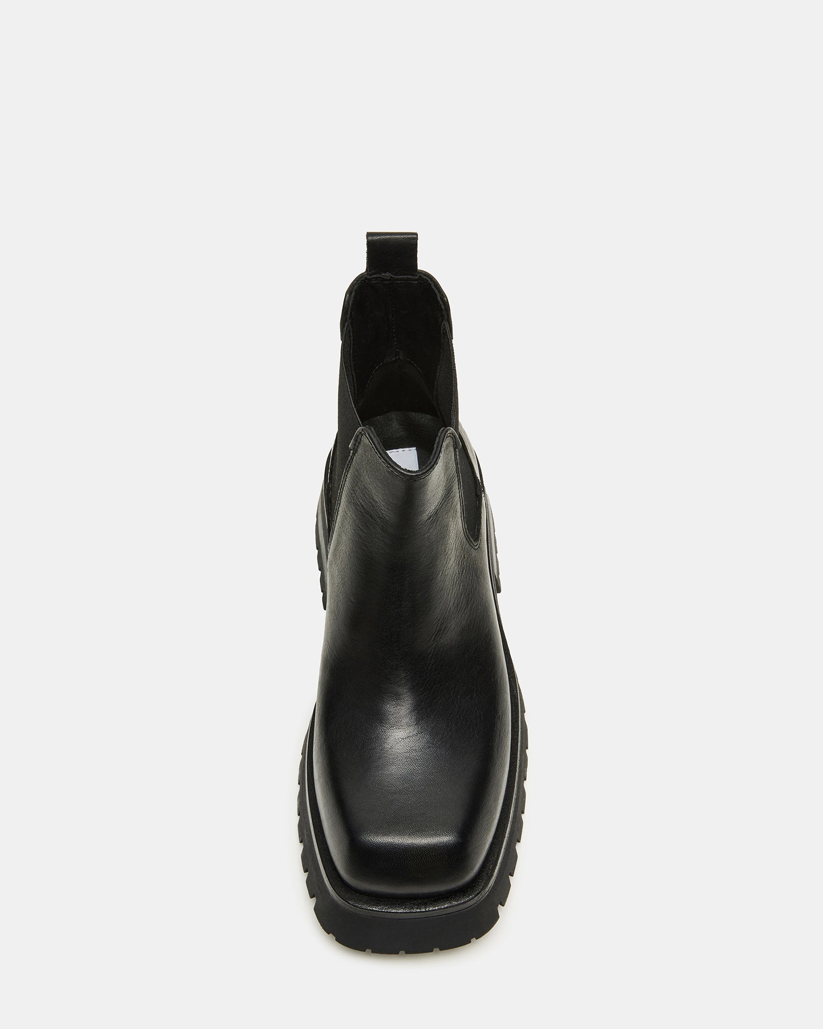 Side view of Burley black Chelsea boots on display.