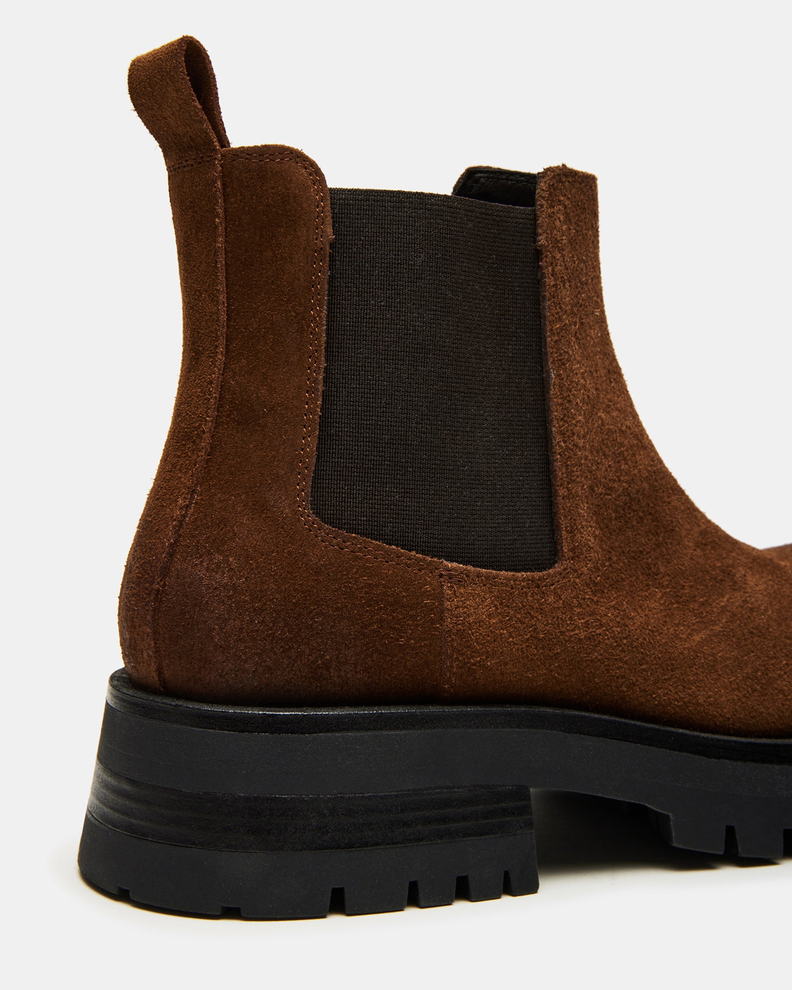 Burley ankle boots worn during a city stroll.