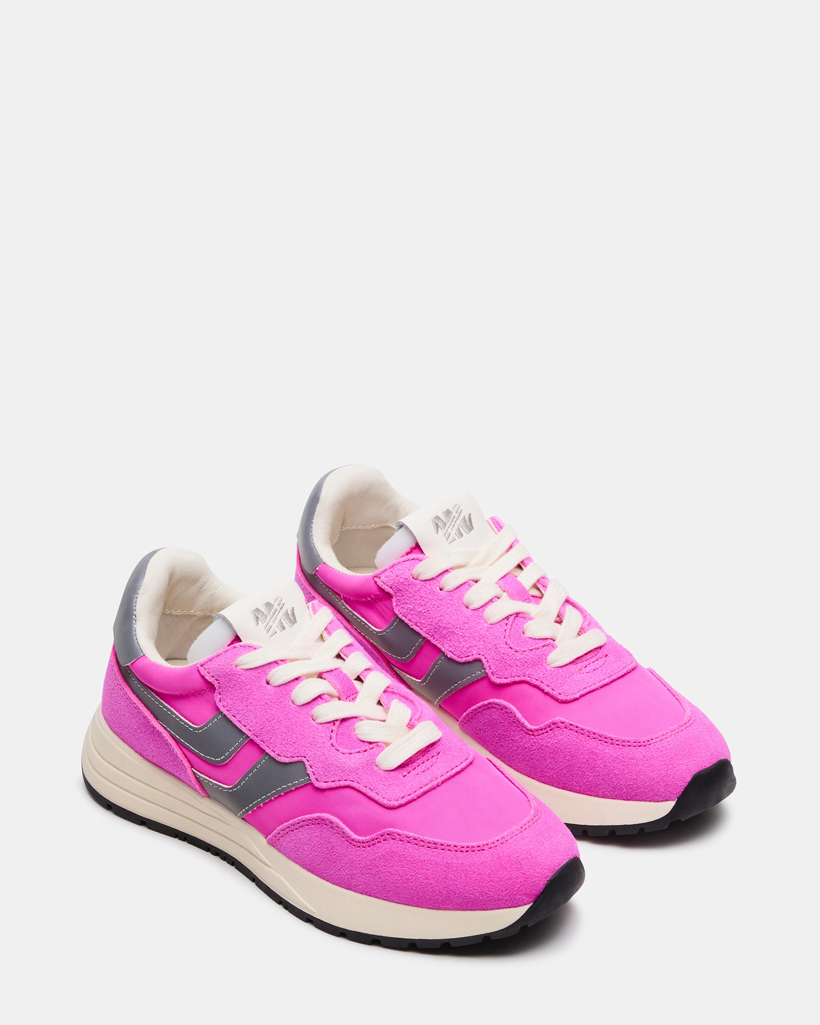 Close-up of the textile and suede materials used in the vibrant fashion sneakers.