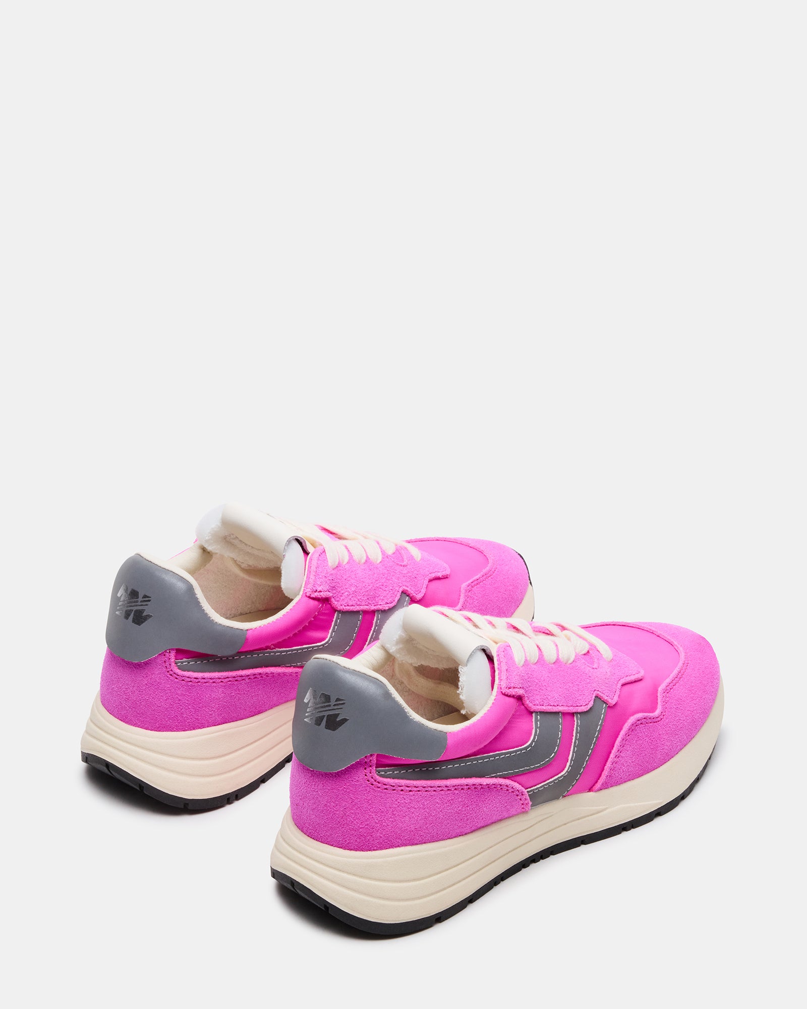 Close-up of the textile and suede materials used in the vibrant fashion sneakers.
