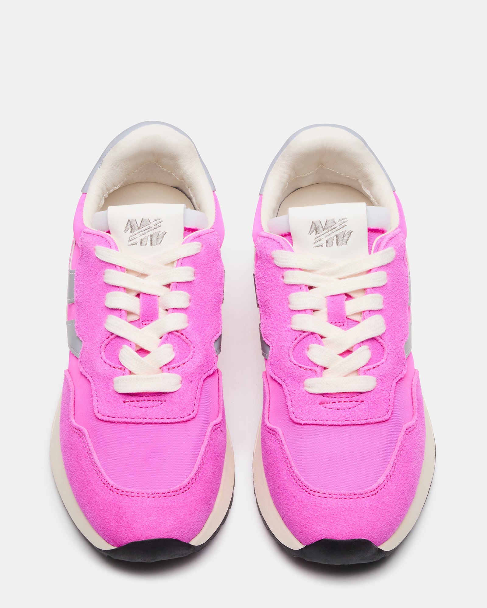 Side angle of Vibrant Burst womens fashion sneakers showcasing pink and white design.