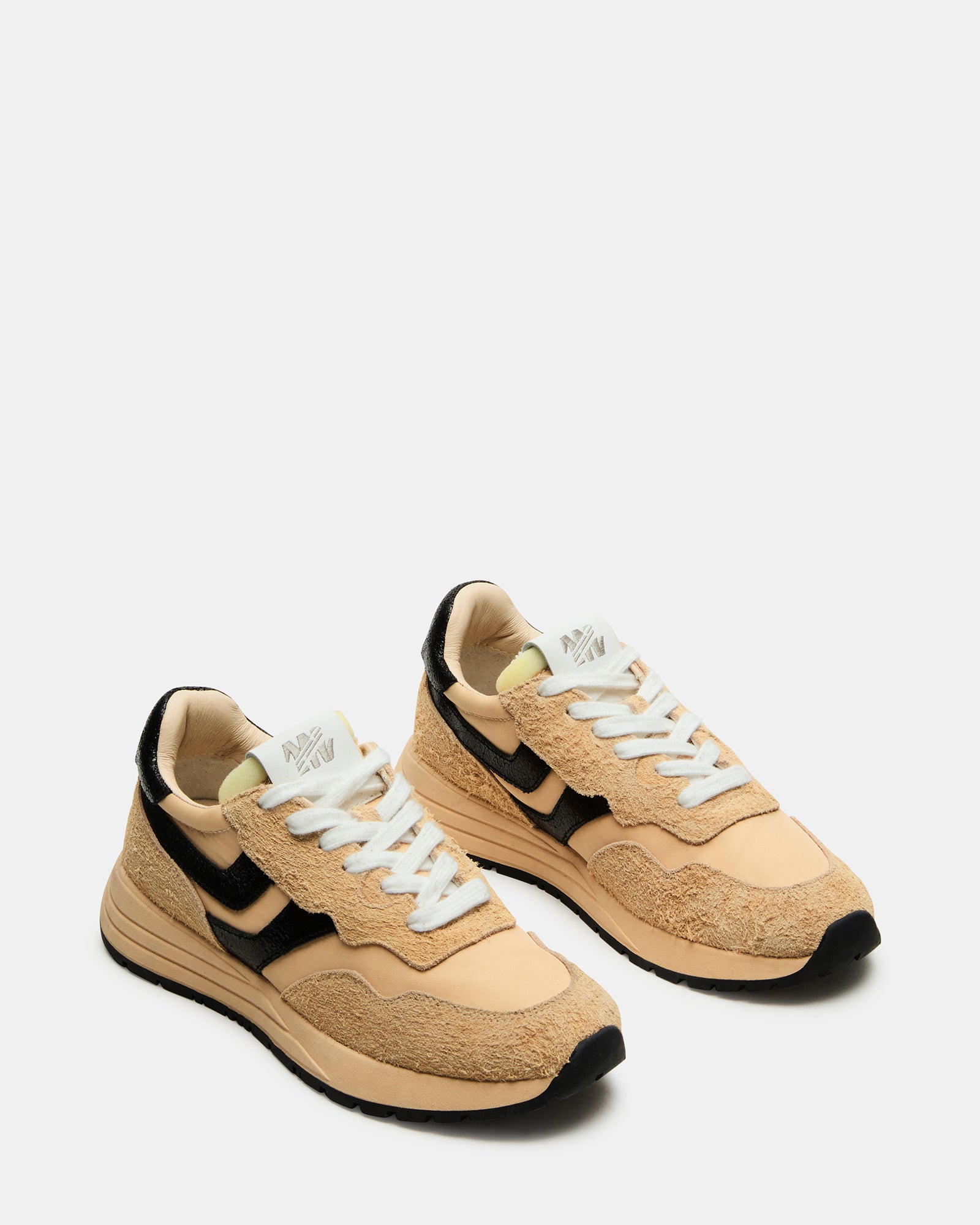 Fashionable mens casual shoes worn with jeans for a casual look