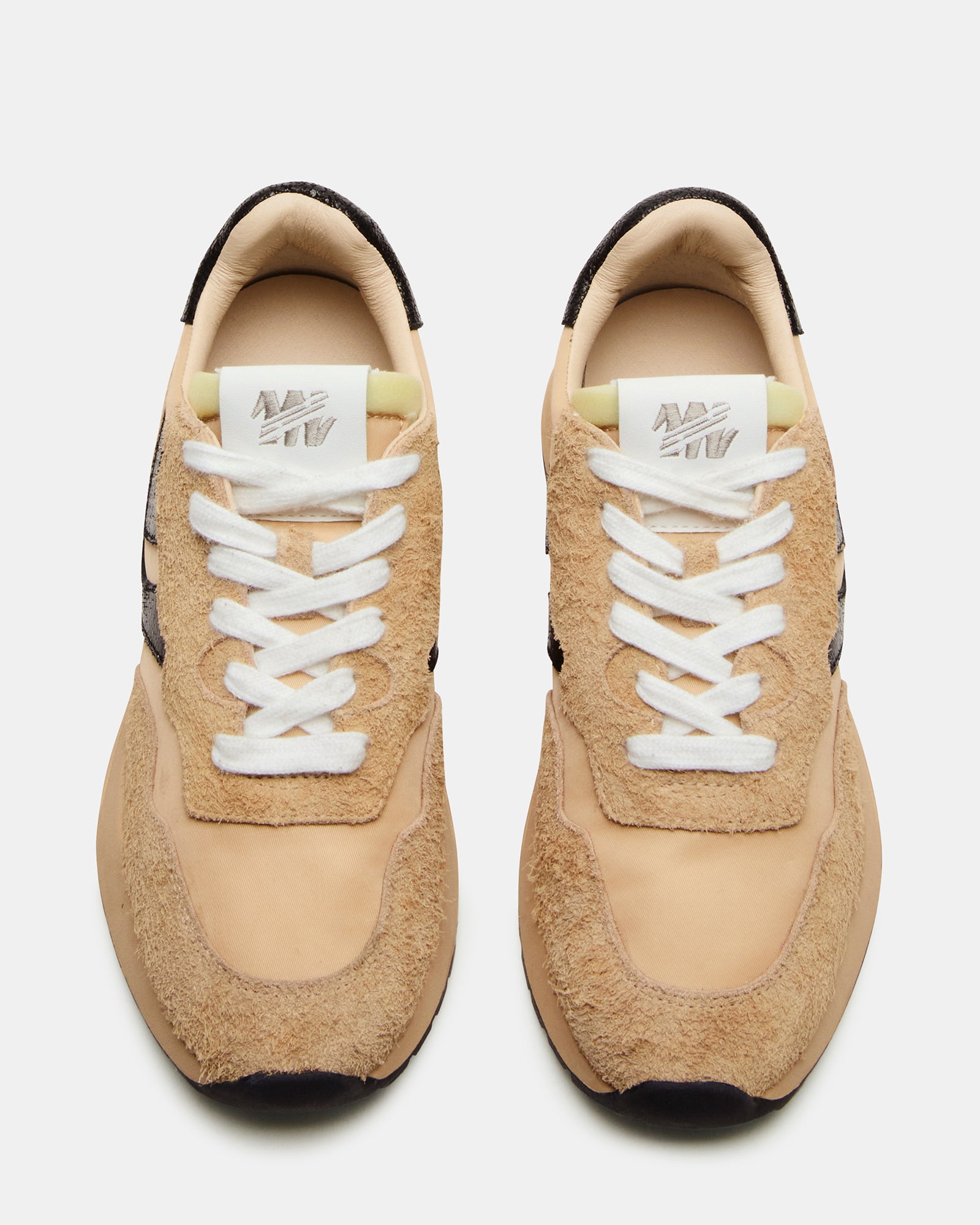 Close-up of the sneakers textured textile and suede upper materials