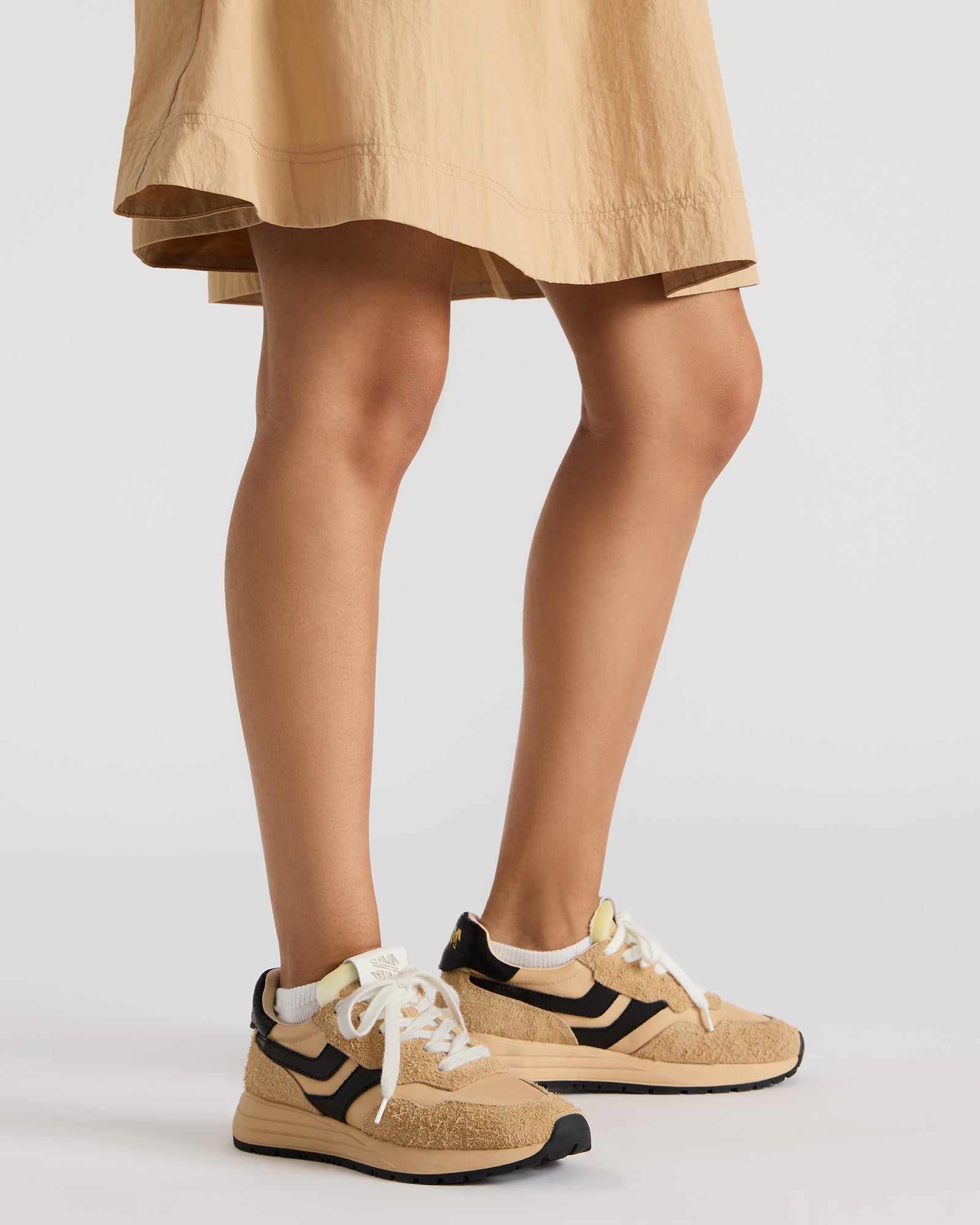 Close-up of the sneakers textured textile and suede upper materials