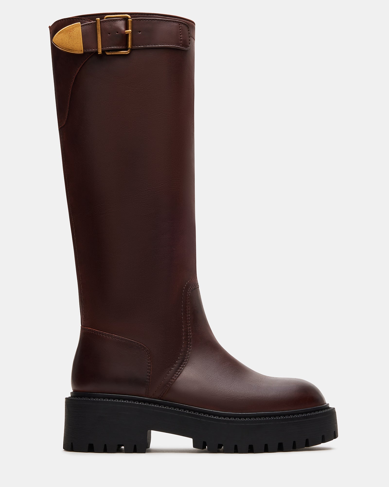 Side view of cognac leather boots showing platform sole and buckle hardware