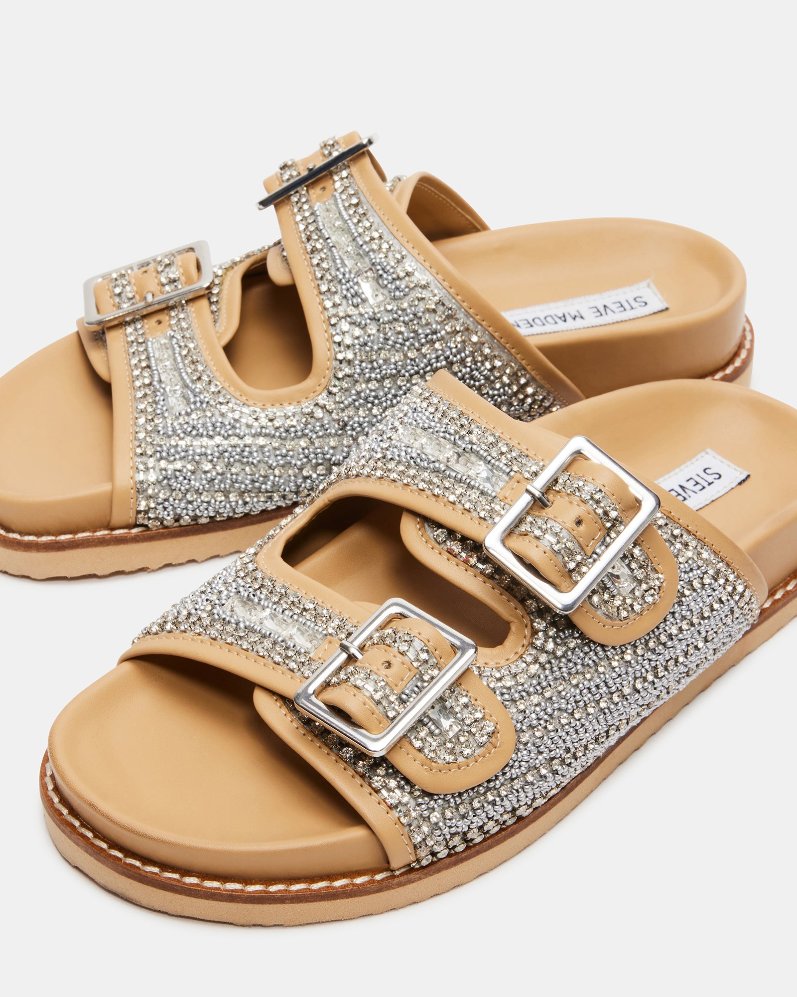 Side view of womens rhinestone flat sandals with vegan leather finish