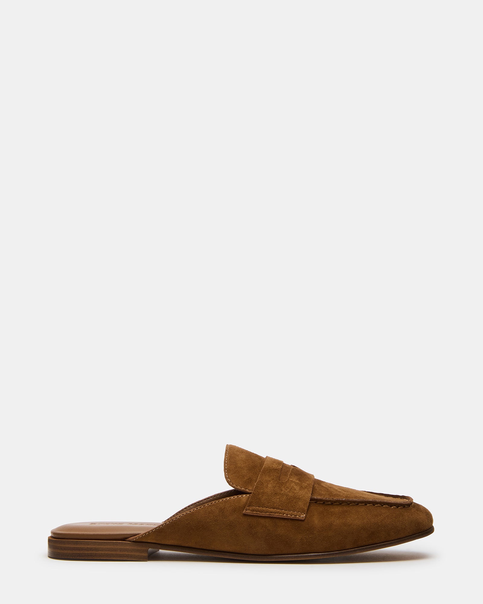 Side view of Caleb camel suede mule showing distressed texture and low heel