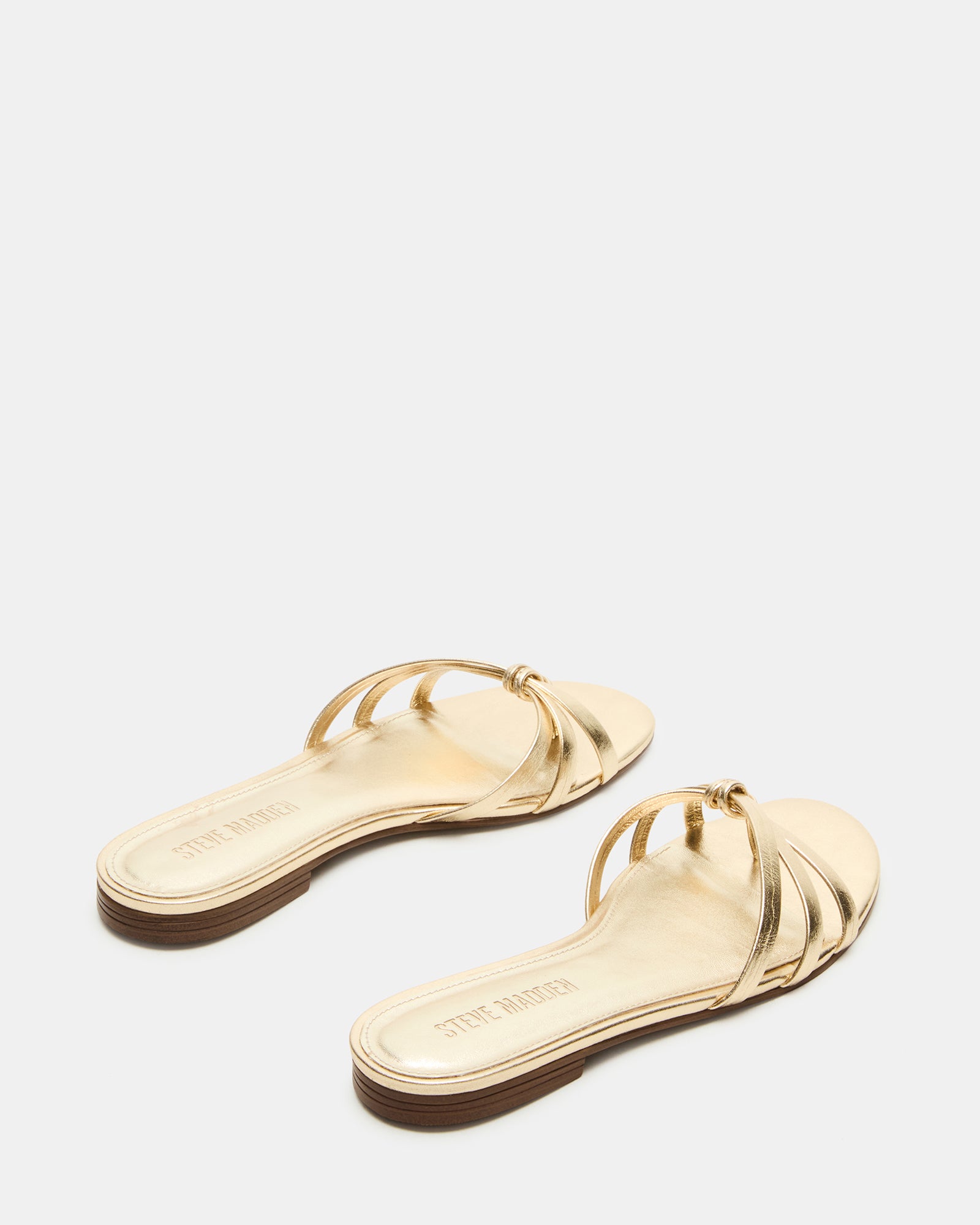 Side view of brown leather sandals women showcasing the sleek design.