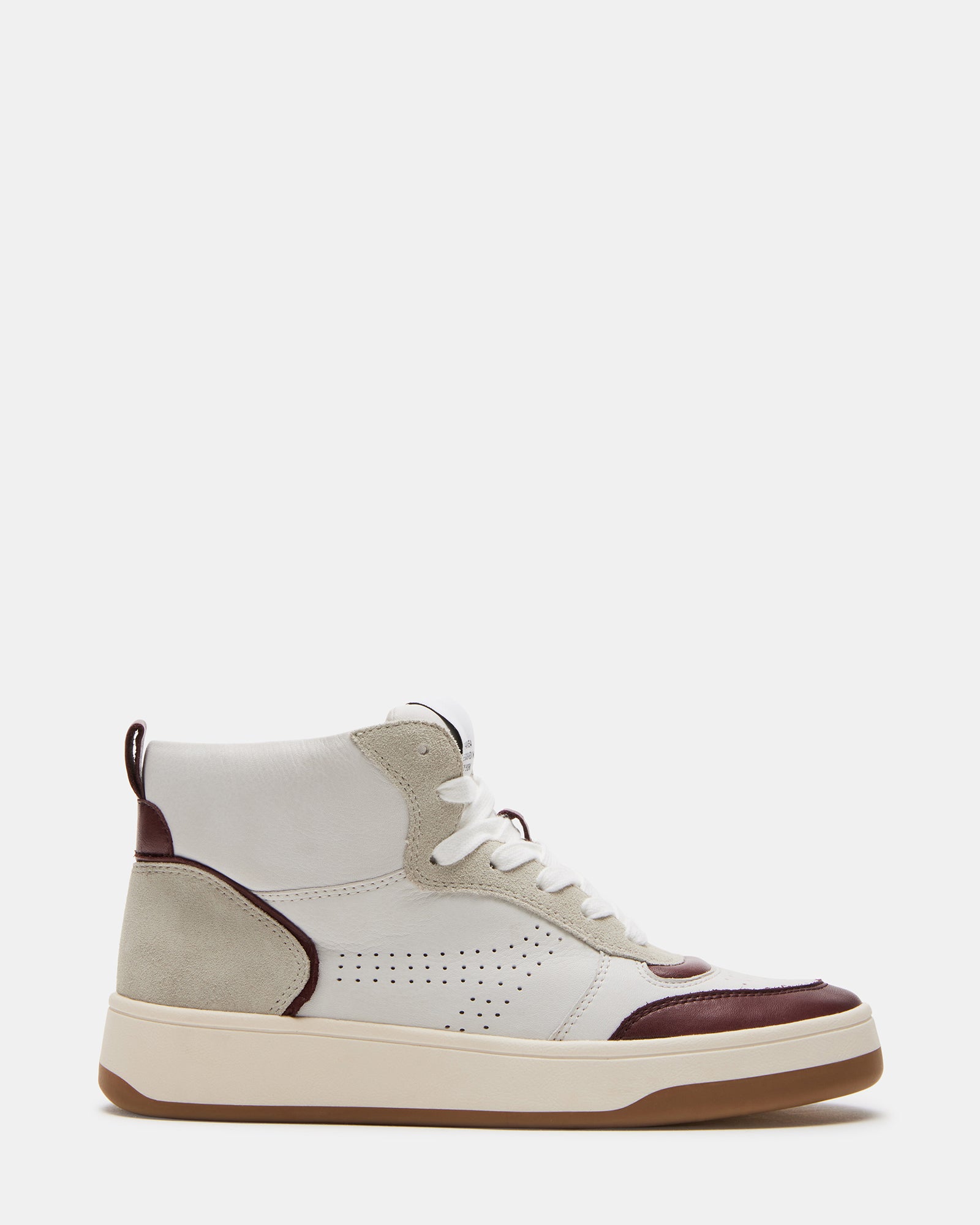 Side view of women's black sneakers styled for casual Chicago streetwear.
