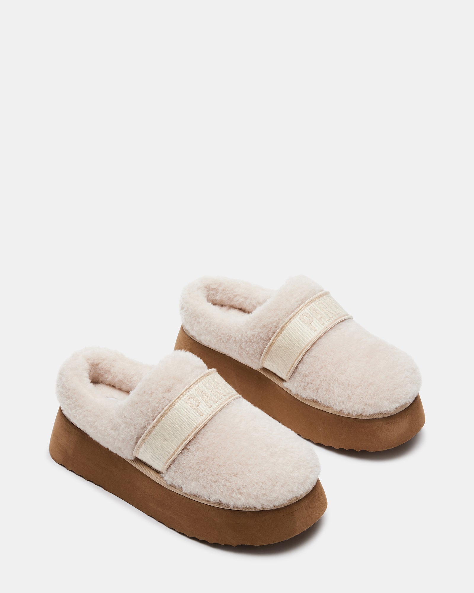 Side view showing shearling lining and 2-inch platform heel
