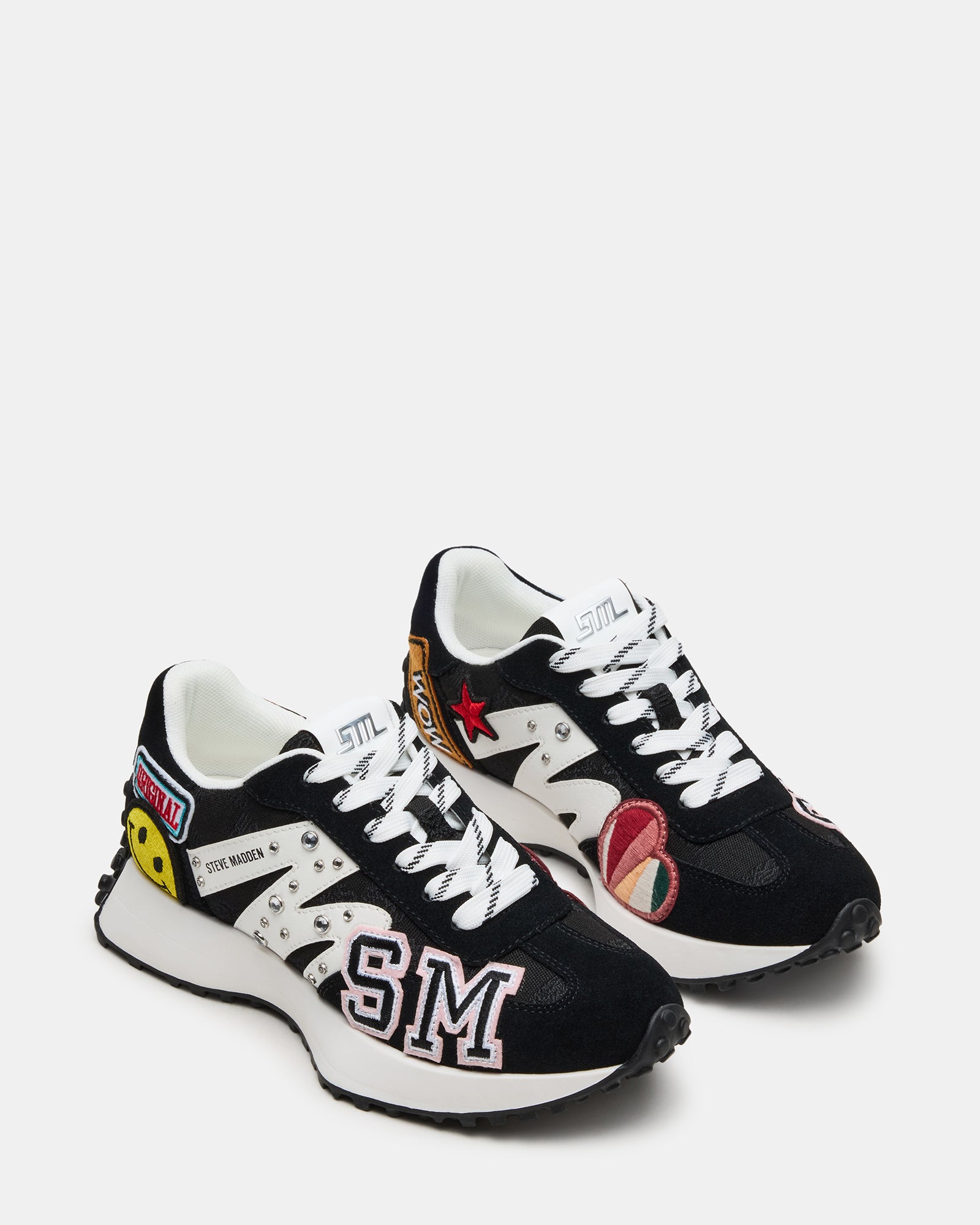 Side profile of platform sneakers women styled with streetwear in downtown setting