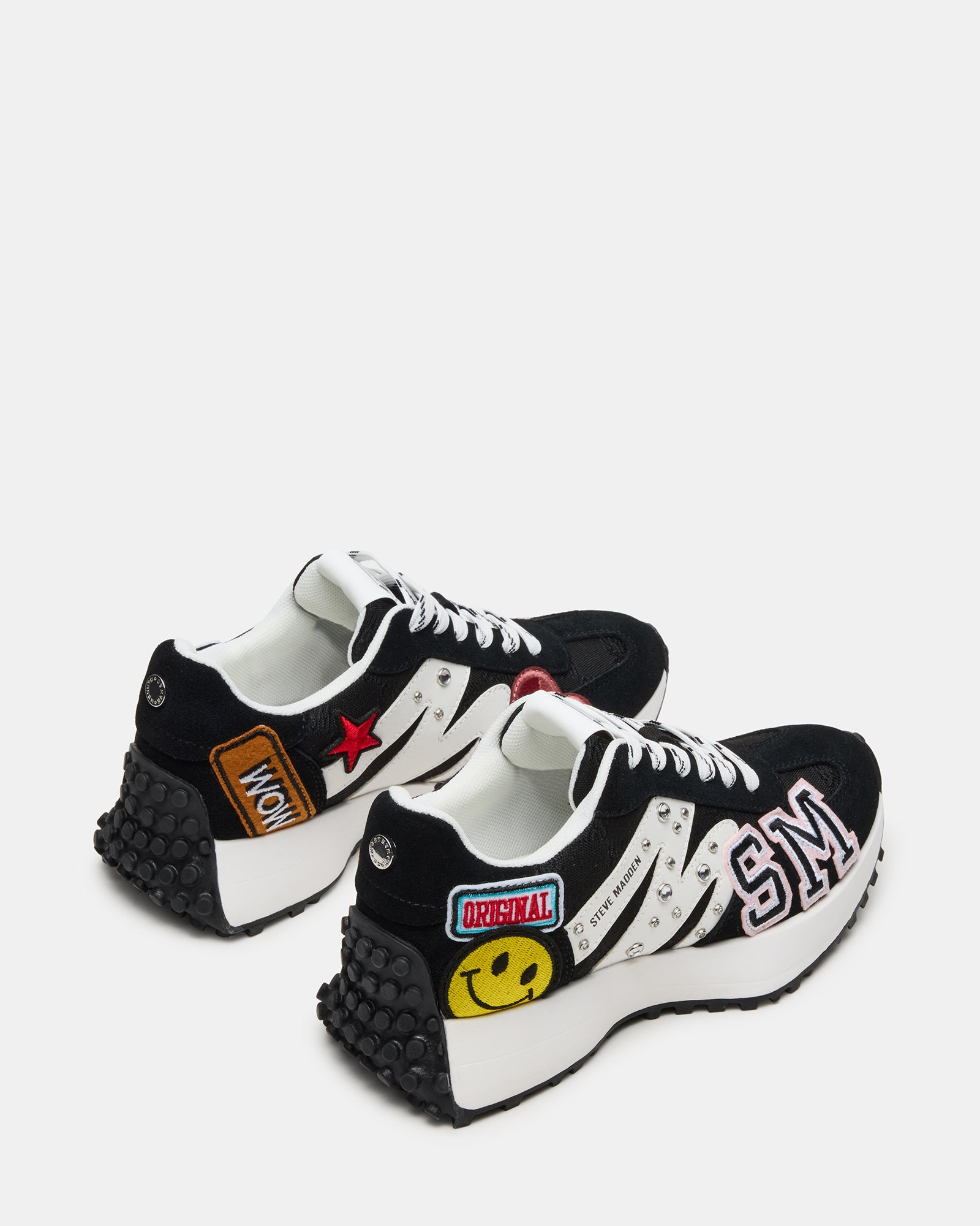 Side profile of platform sneakers women styled with streetwear in downtown setting