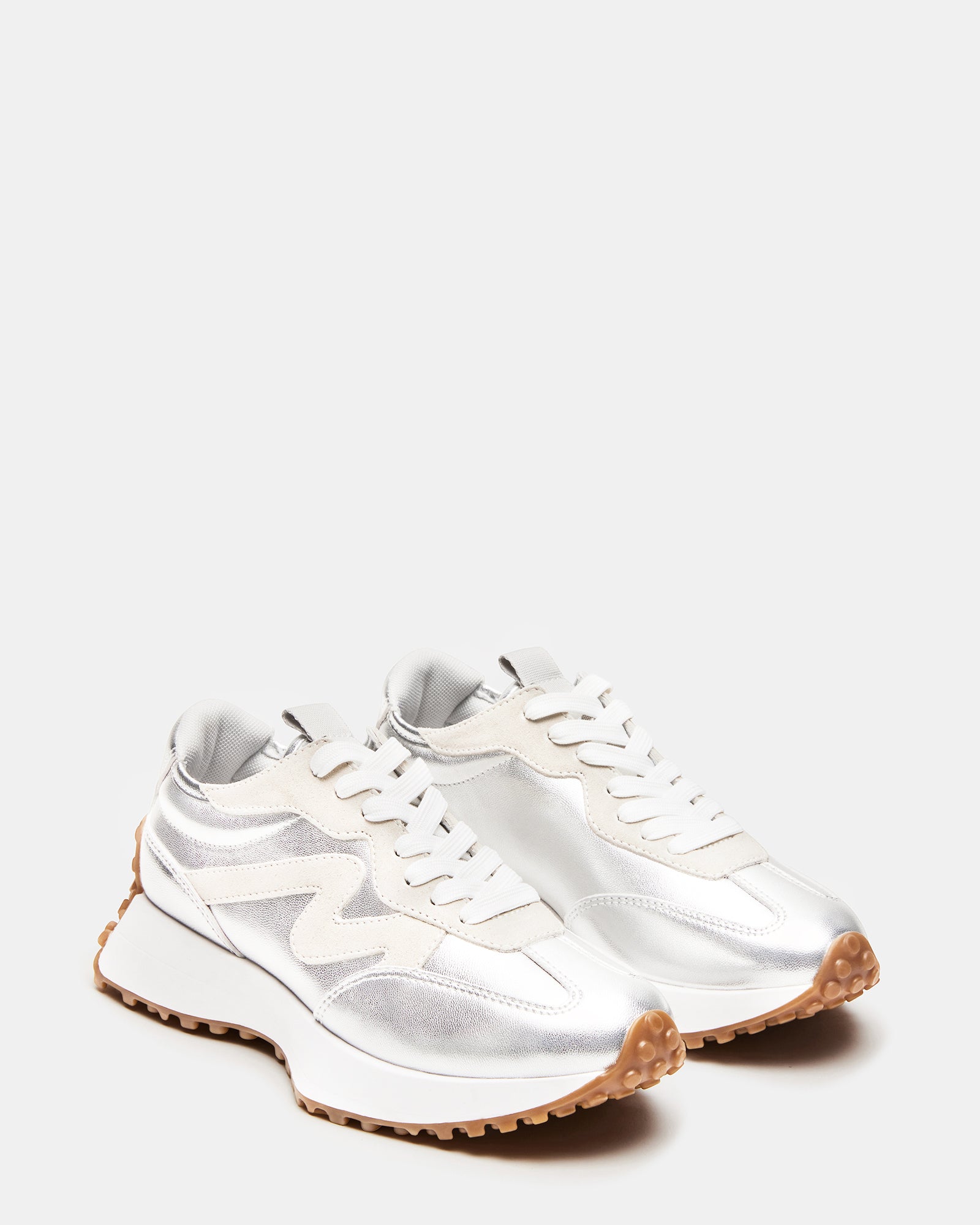 White platform shoes styled with casual denim for everyday wear