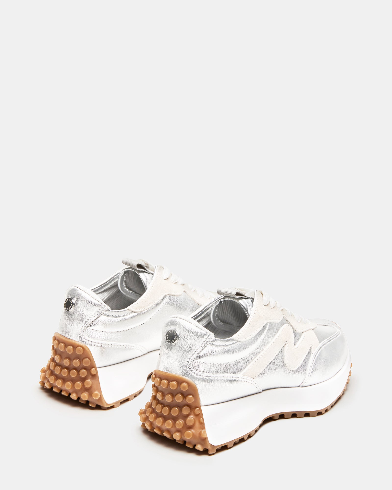 White platform shoes styled with casual denim for everyday wear