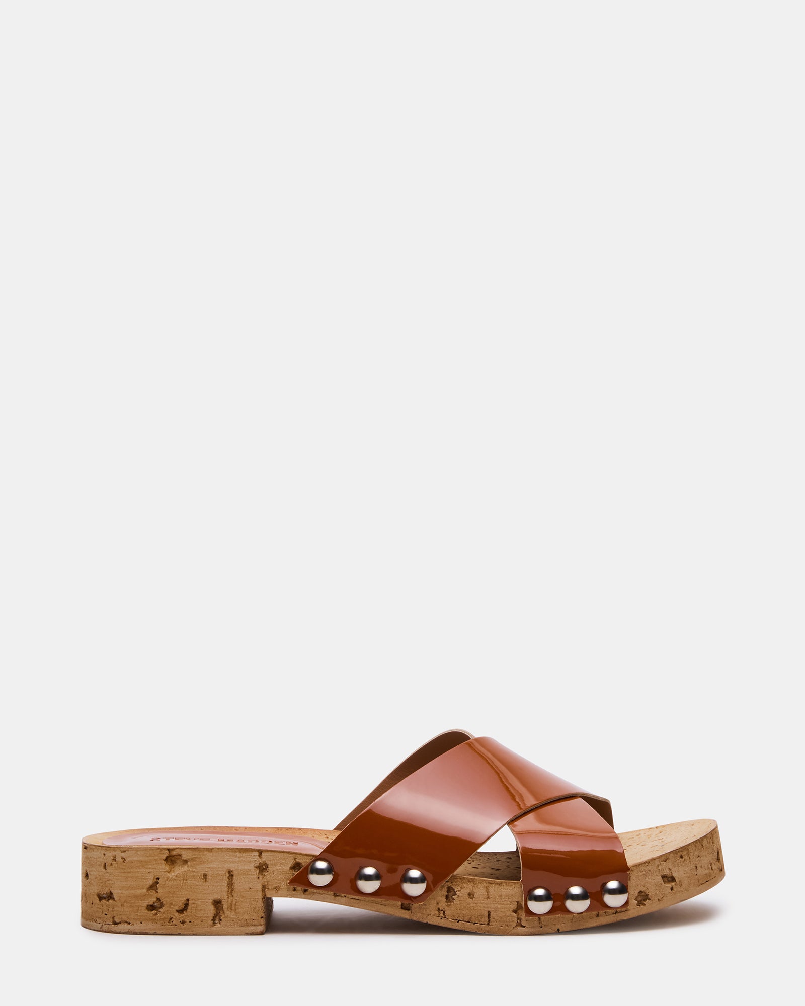 Top view of camel slide sandals with stud details and glossy finish