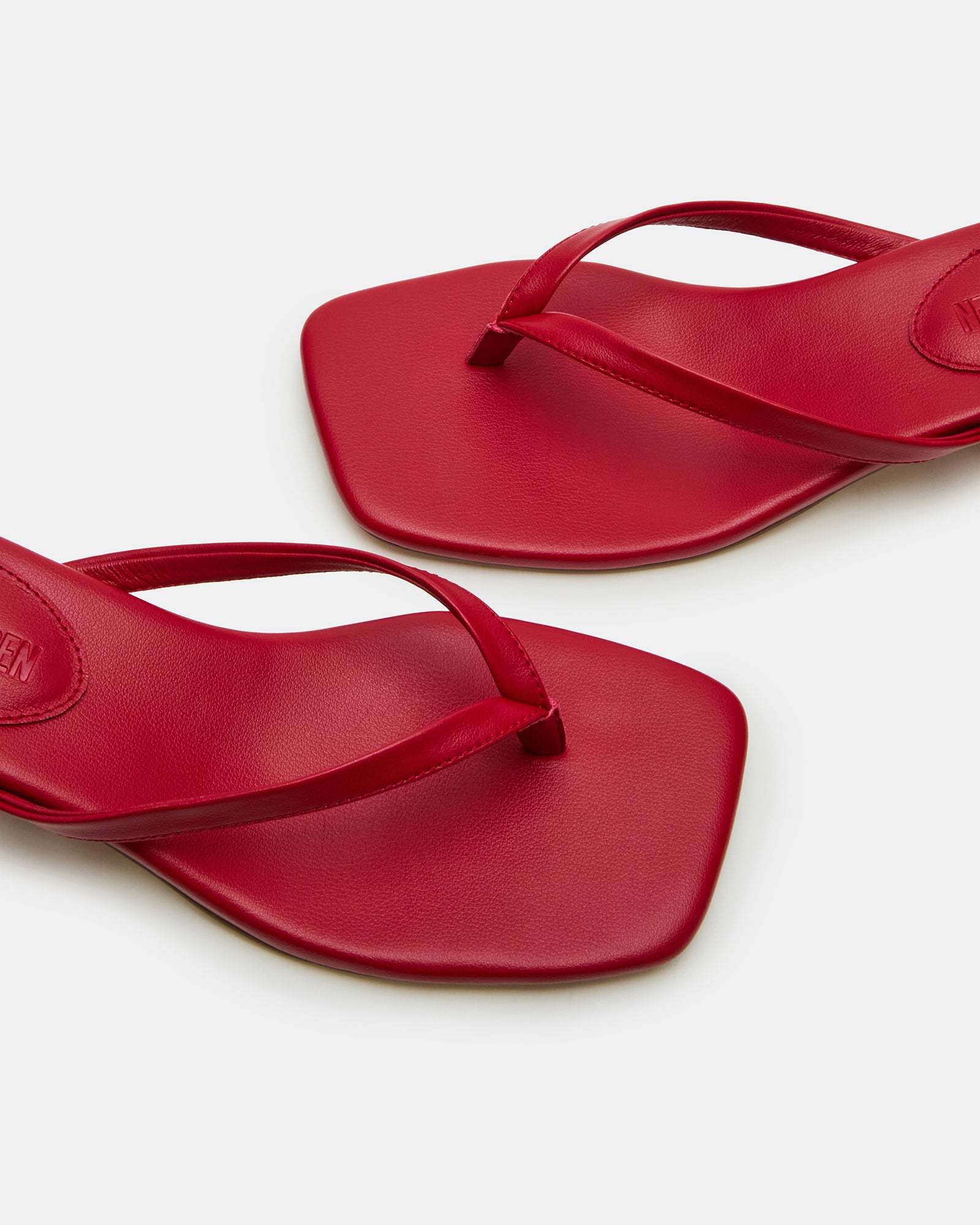 Caribbean Red platform mule sandals worn during a summer outing.