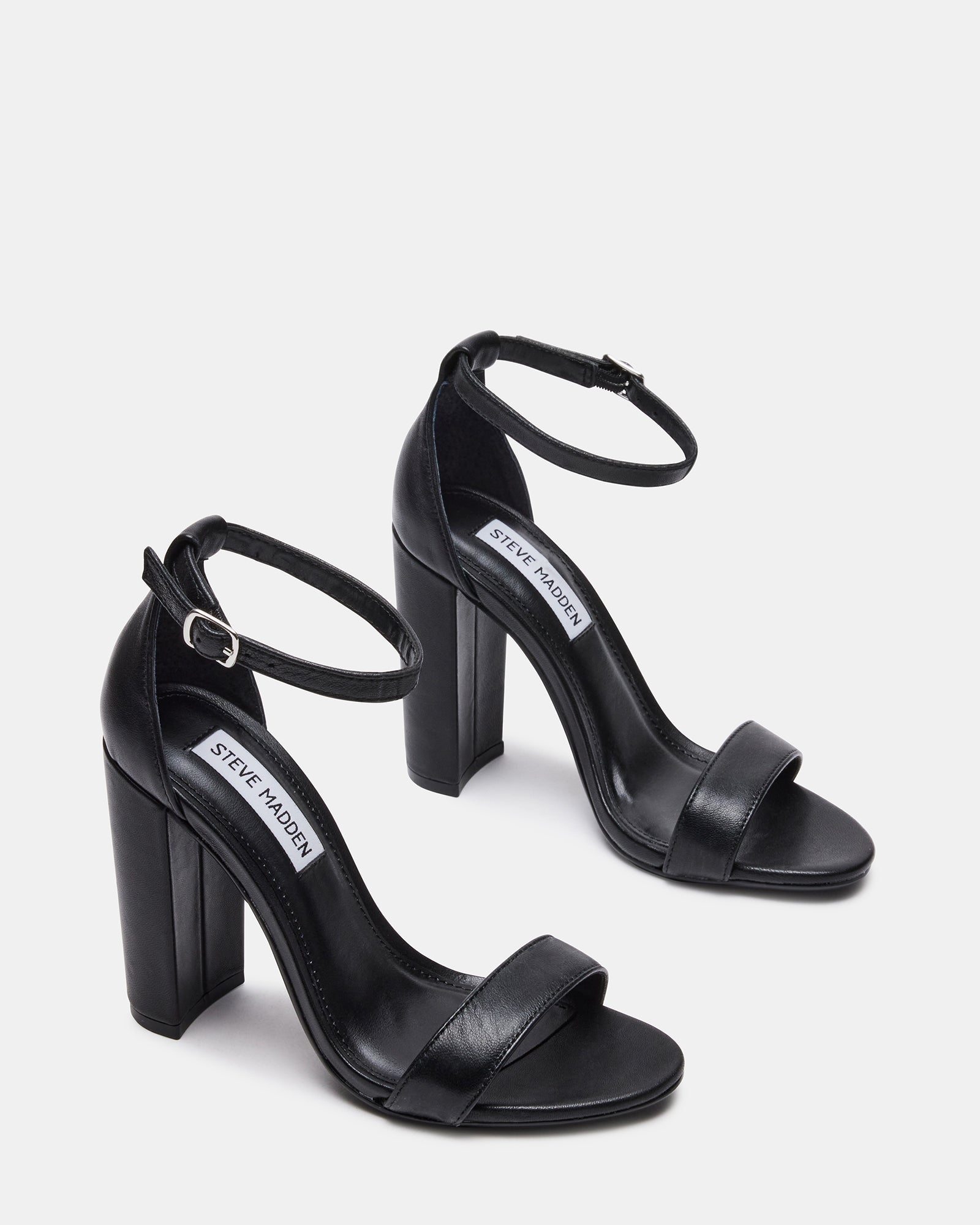 Close-up of the sandals buckle and leather upper material