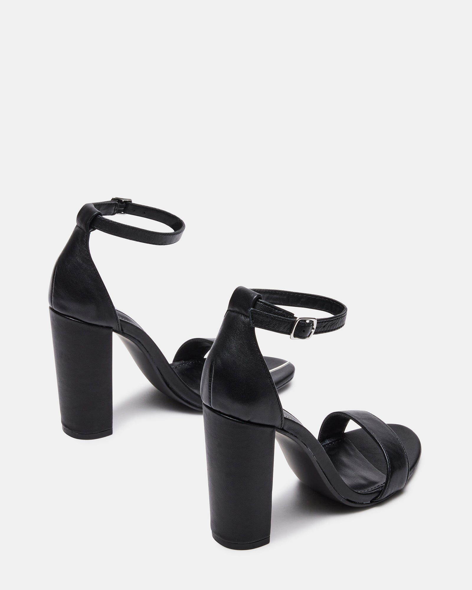 Close-up of the sandals buckle and leather upper material