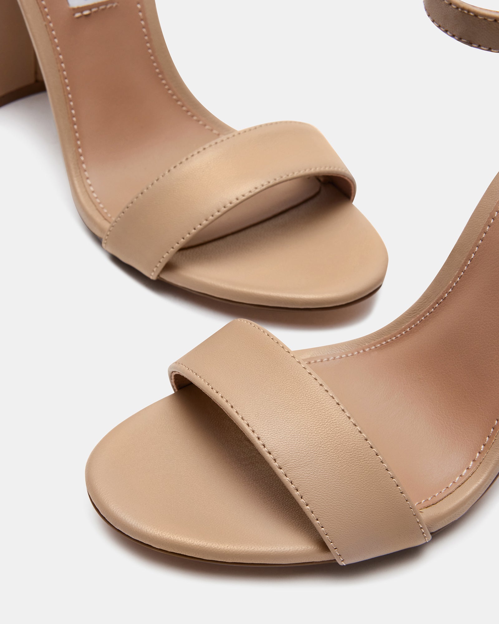 Carrson blush leather block heel sandals from the side, highlighting the adjustable ankle strap.
