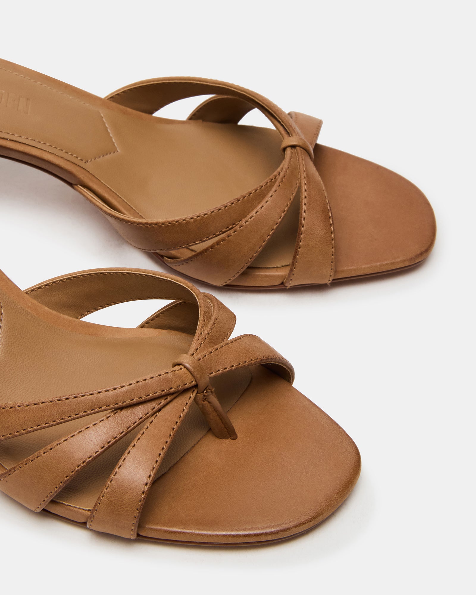 Close-up of the square toe and leather stitching details.