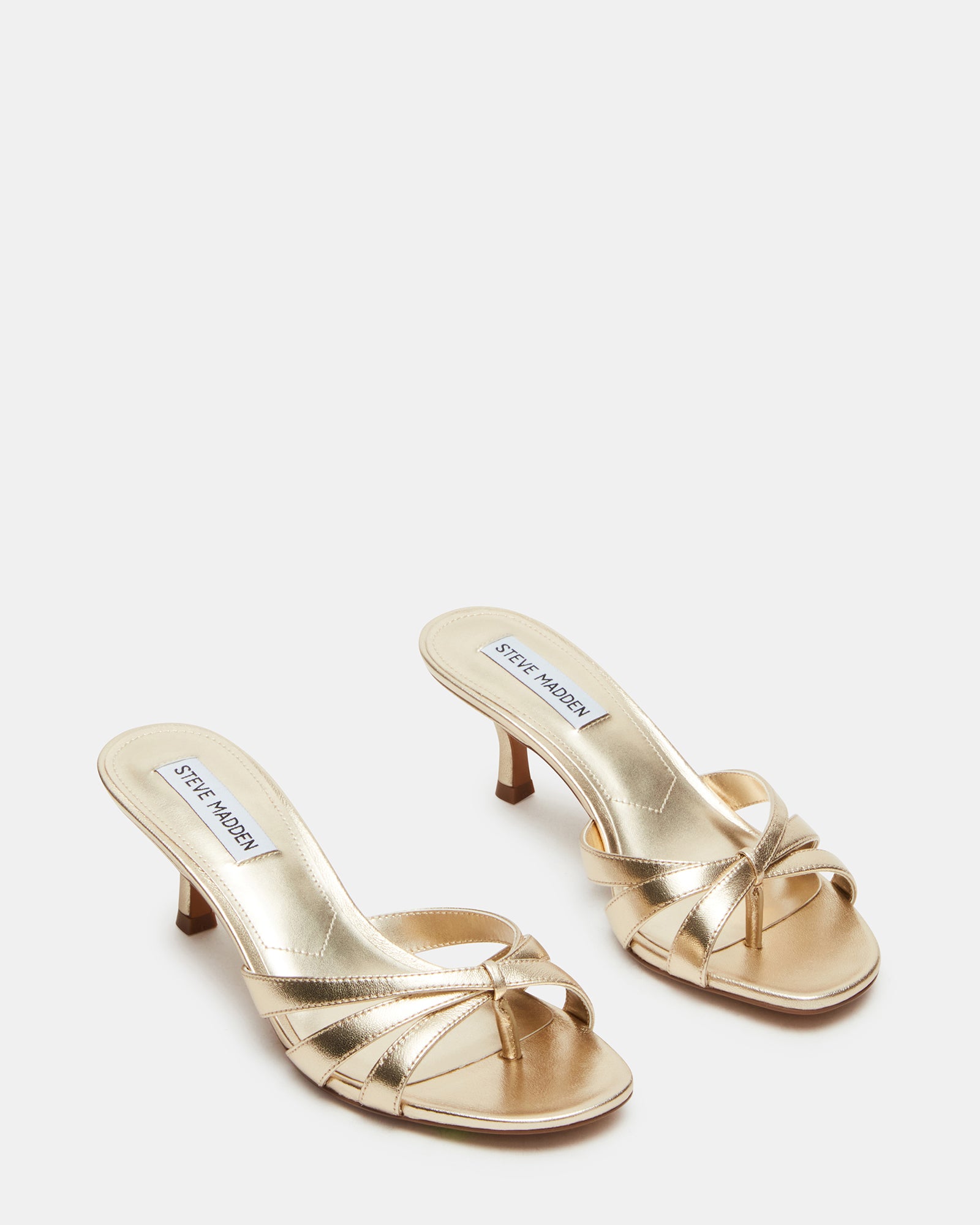 Close-up of the heel and sole of Cary Gold Leather mules, emphasizing comfort and craftsmanship