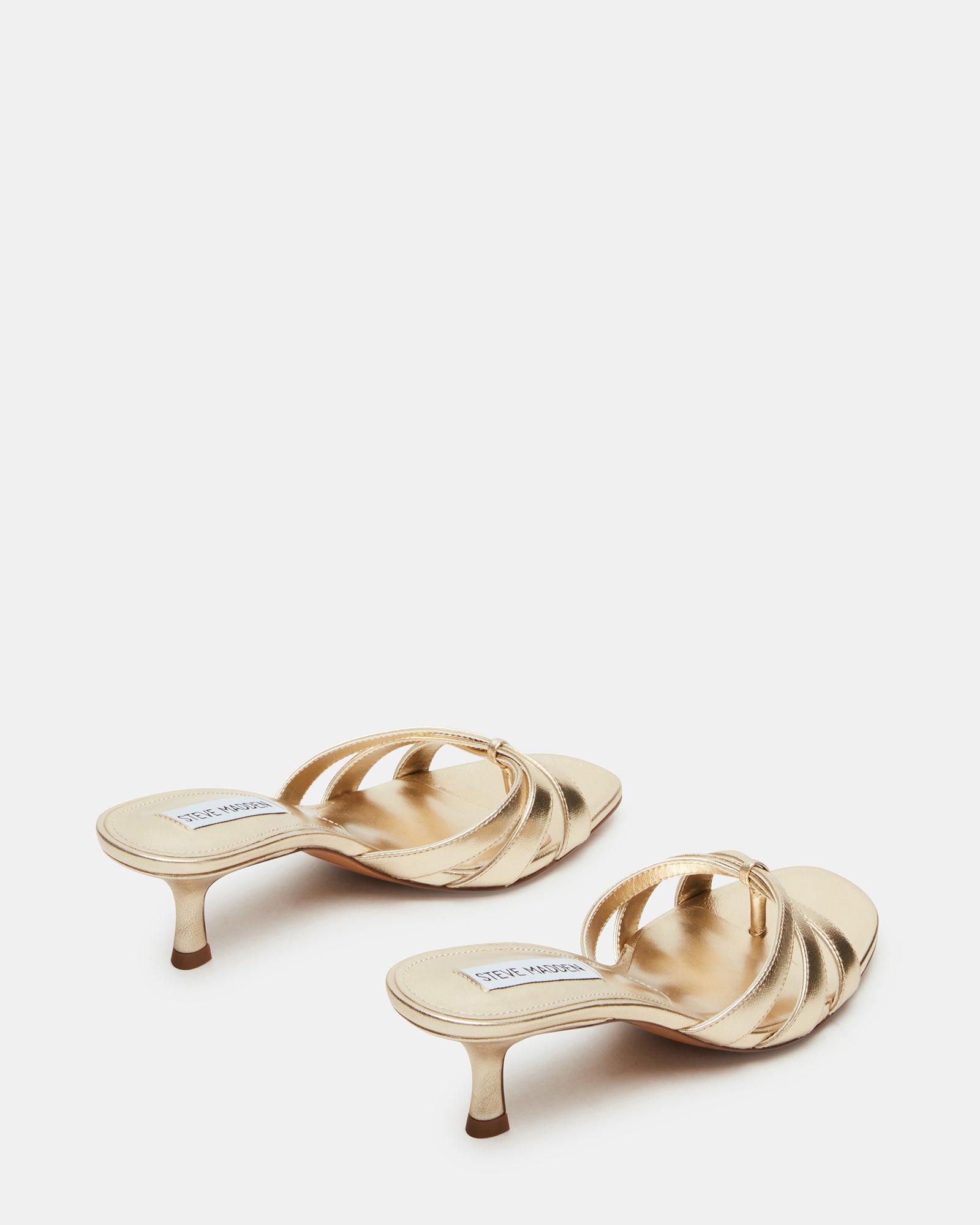 Close-up of the heel and sole of Cary Gold Leather mules, emphasizing comfort and craftsmanship