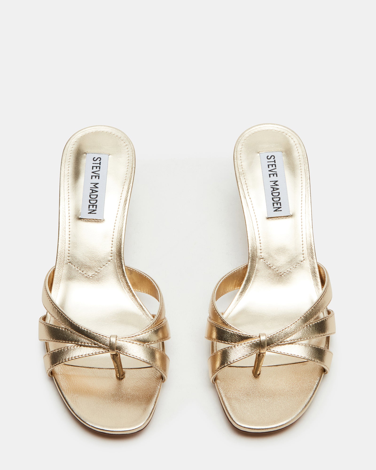 Side view of Cary Gold Leather mules highlighting the stylish design and premium leather material