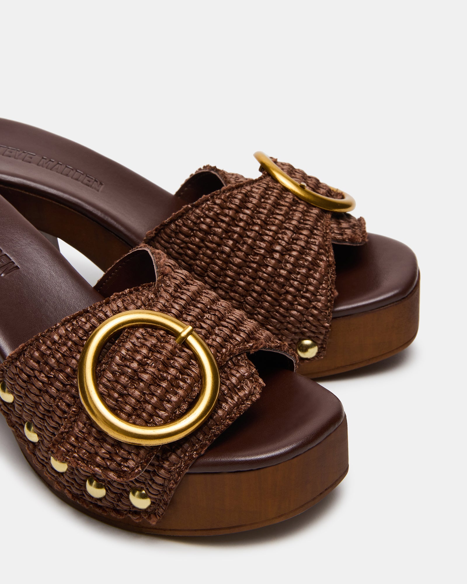 Detail shot of square toe sandals with buckle hardware