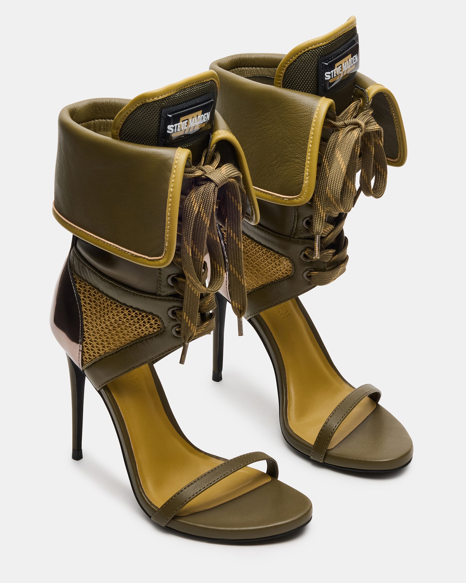 Close-up of black open toe heels showcasing the intricate lace-up design.