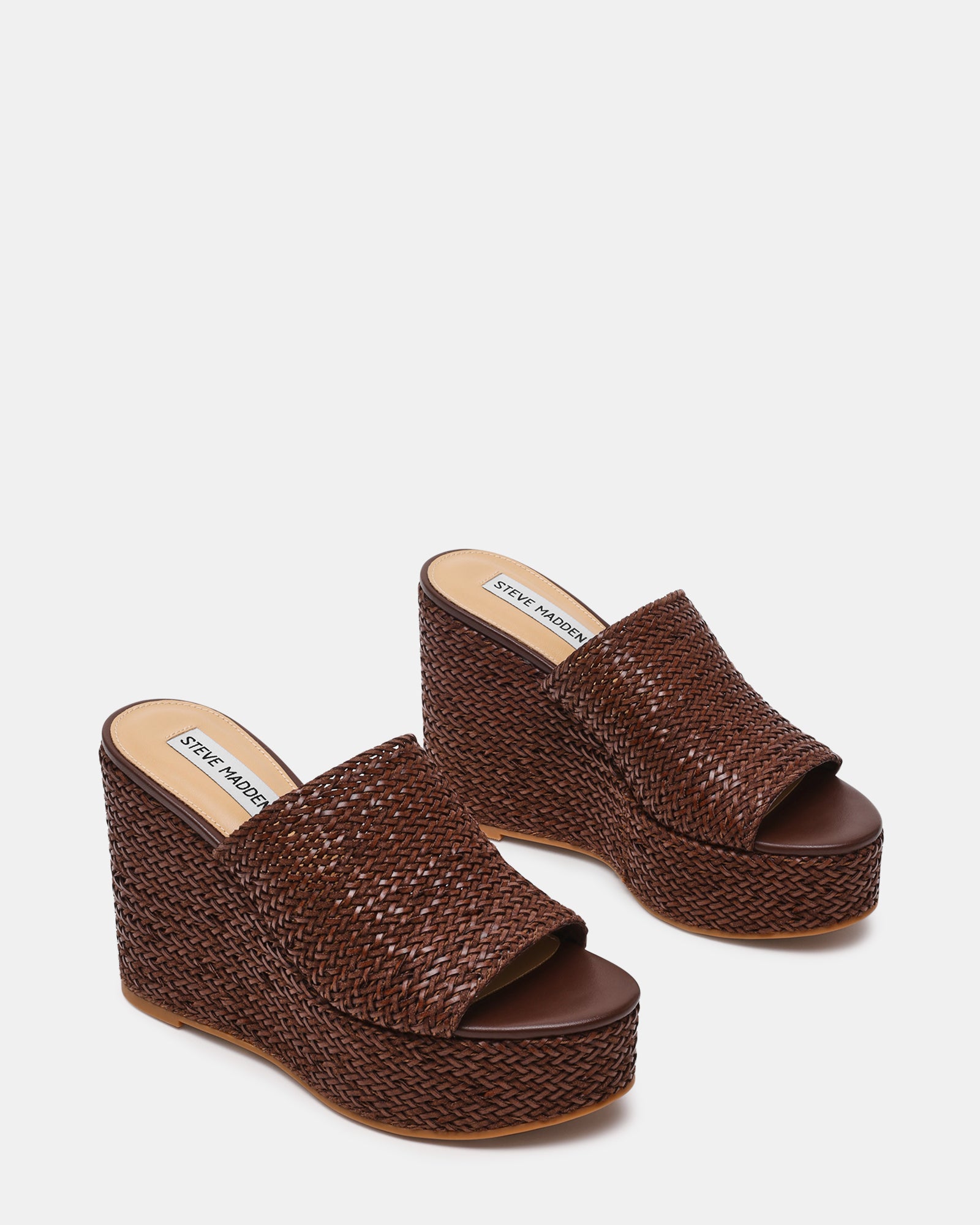 Close-up of the platform heel of the Cassi Brown sandals, highlighting comfort.