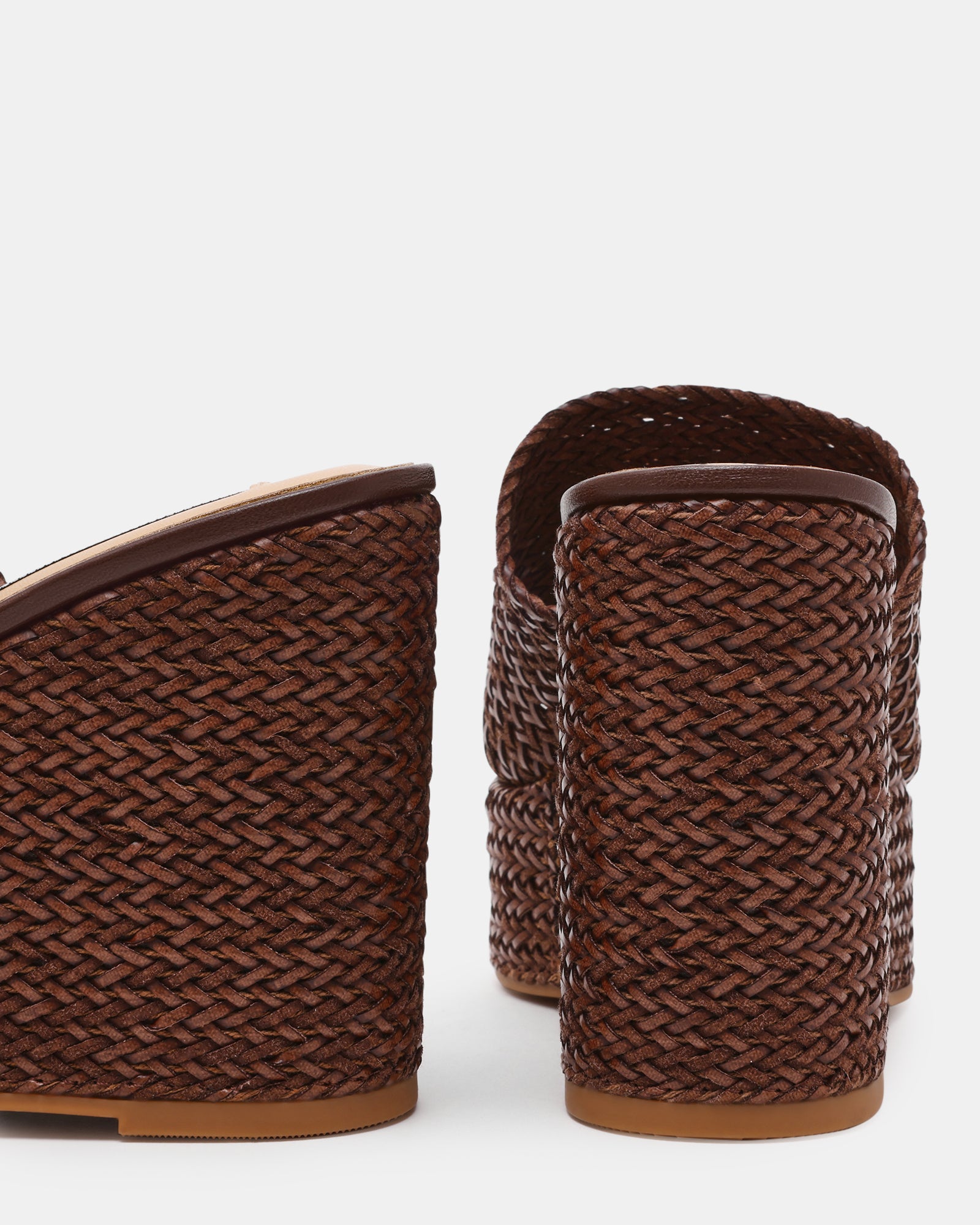 Cassi Brown wedge sandals styled with a casual outfit for summer outings.