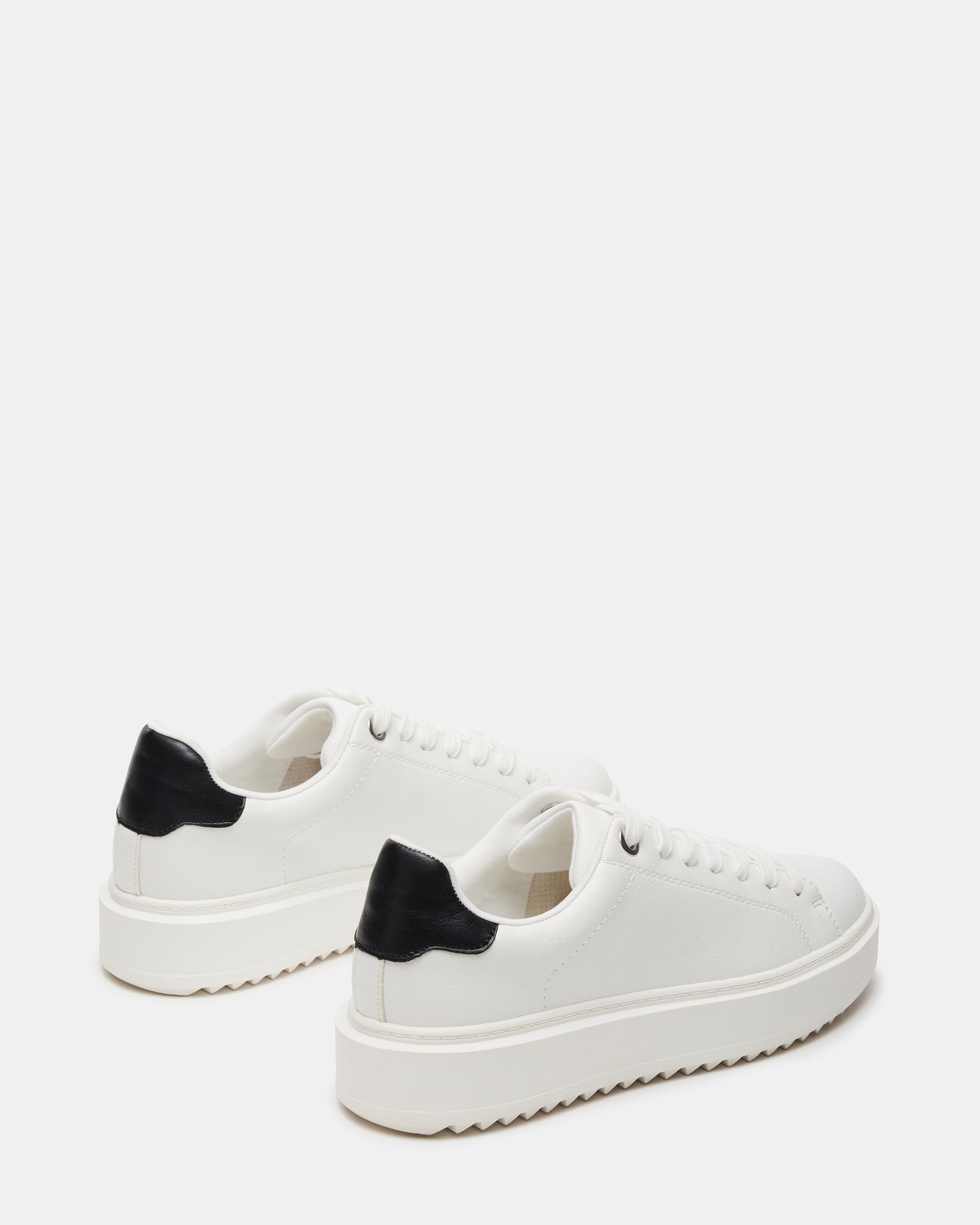 Close-up detail of catcher sneakers textured sole and stitching