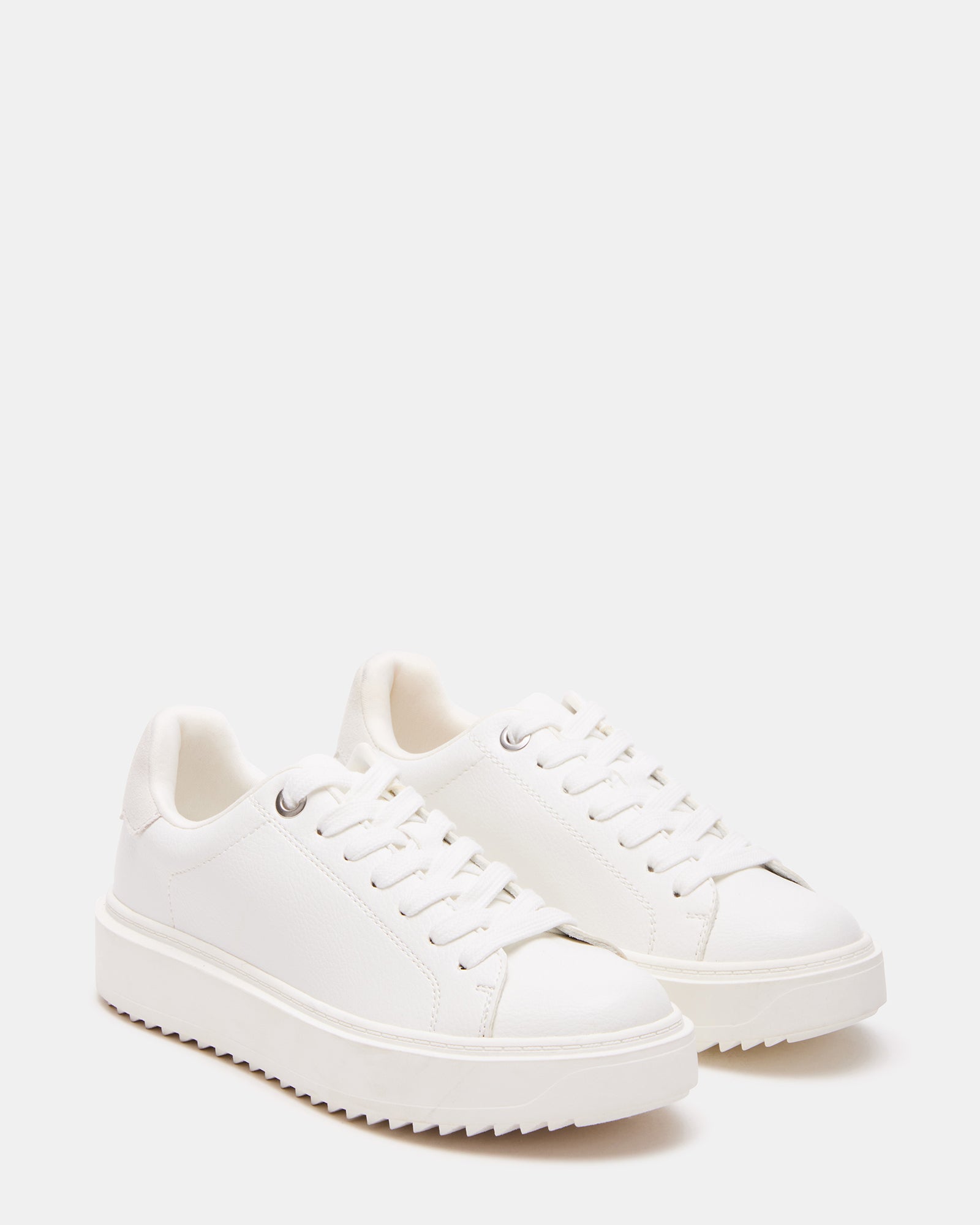 Close-up of vegan leather and suede upper of Catcher White Sneakers.