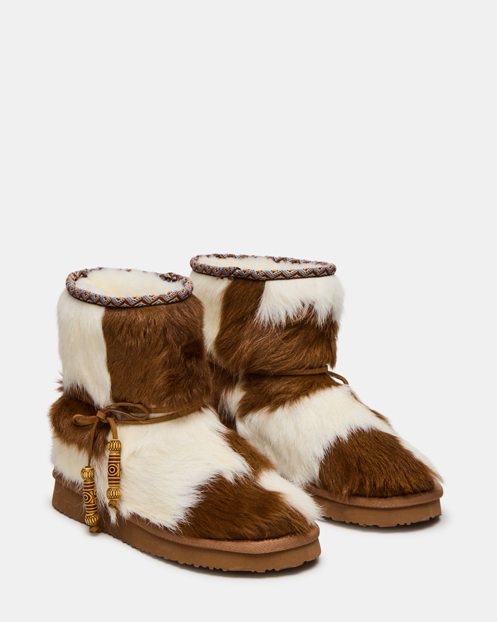 Top view showing faux fur lining inside black ankle boots for women