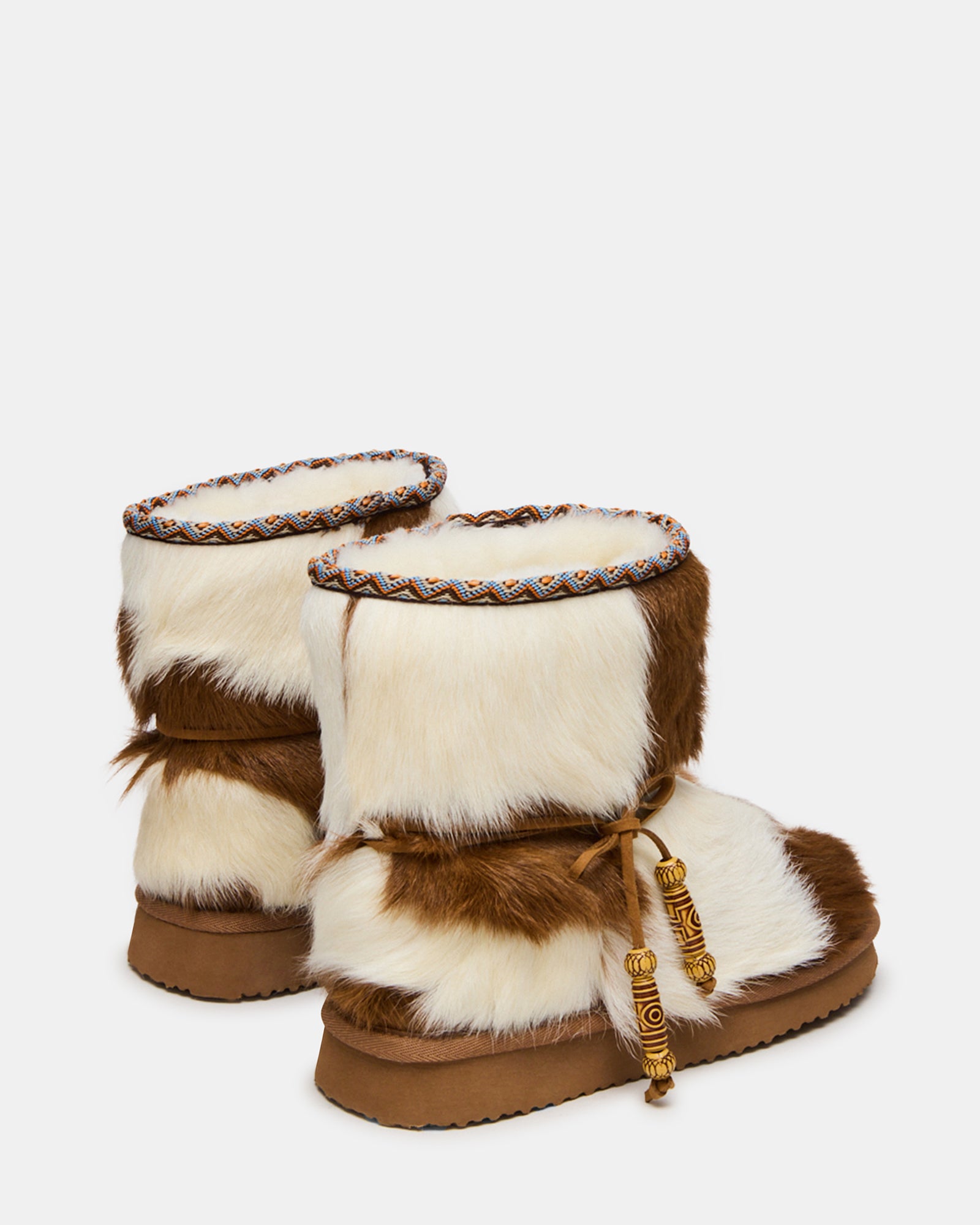 Top view showing faux fur lining inside black ankle boots for women