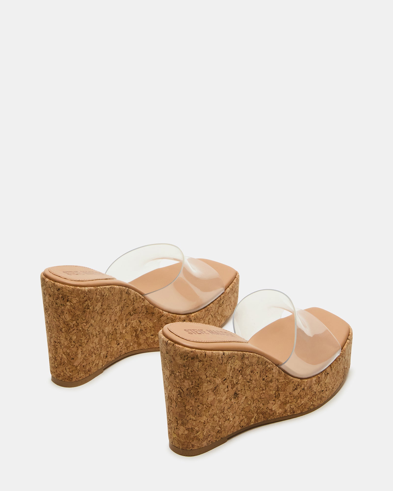 Fashionable white wedge sandals styled with summer dress