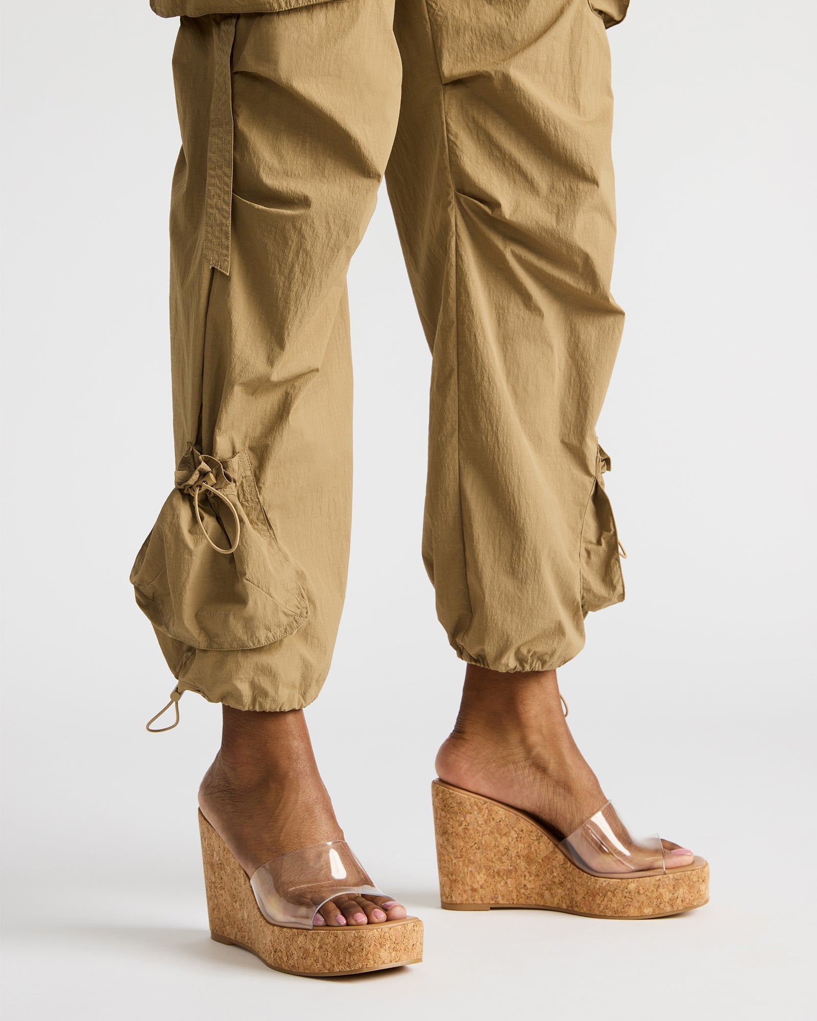 Close-up of the transparent PVC upper on Cayman wedge sandals for women