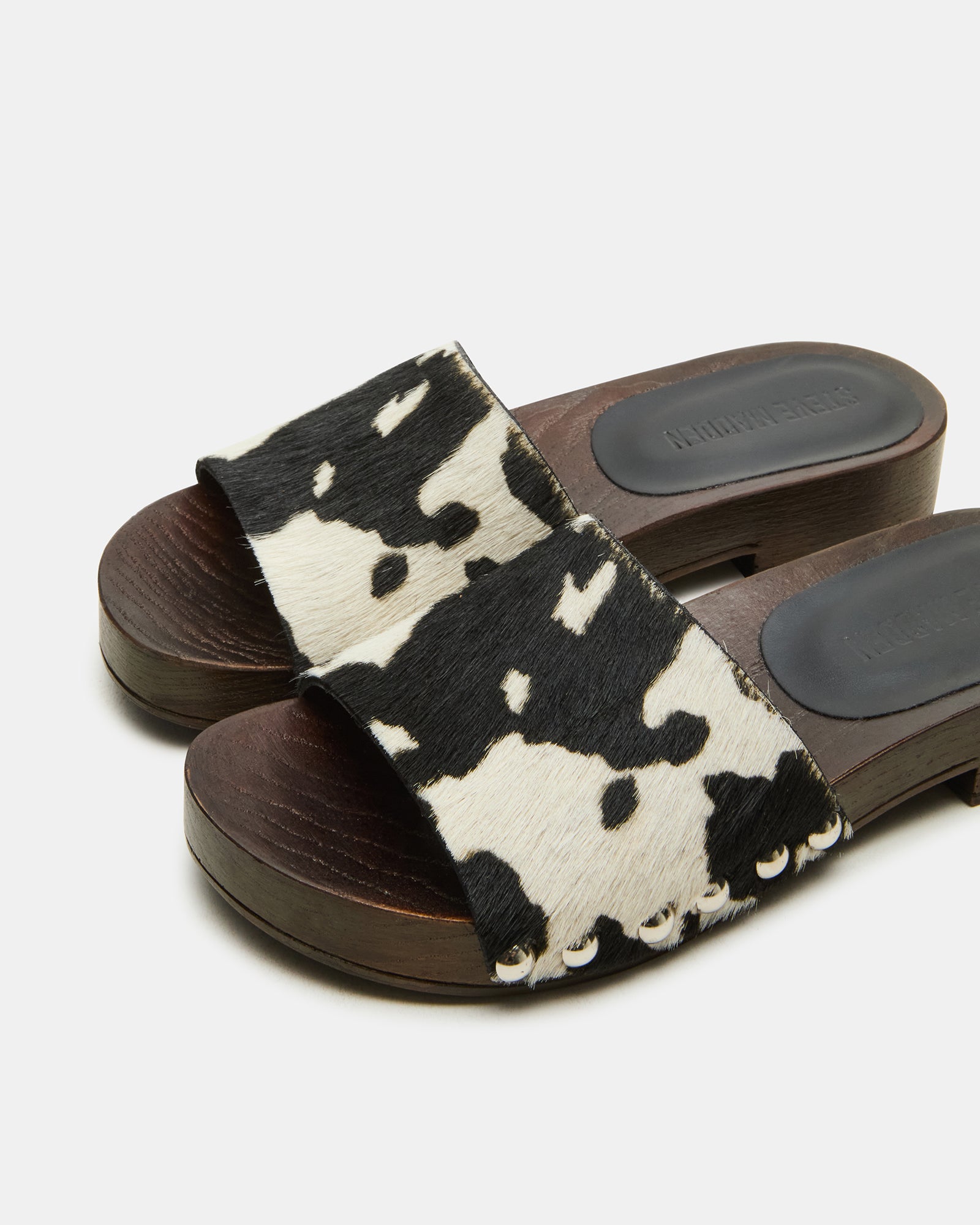 Lifestyle shot of sandals worn at a summer gathering