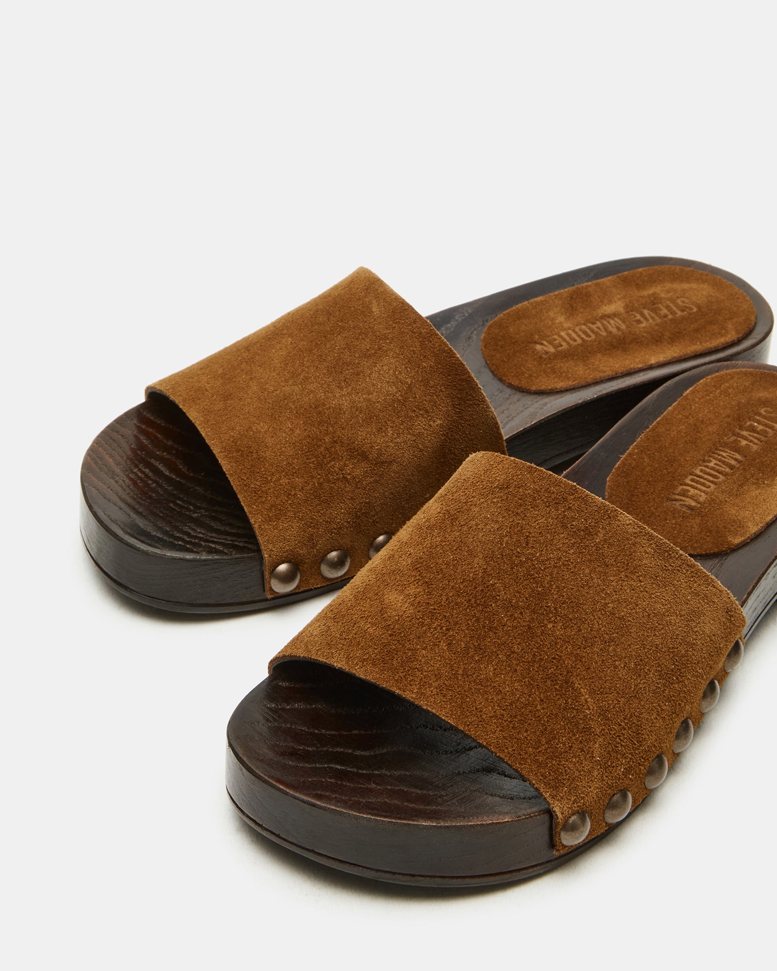 Stylish Cento suede slide sandals showcasing studded details for a trendy look.