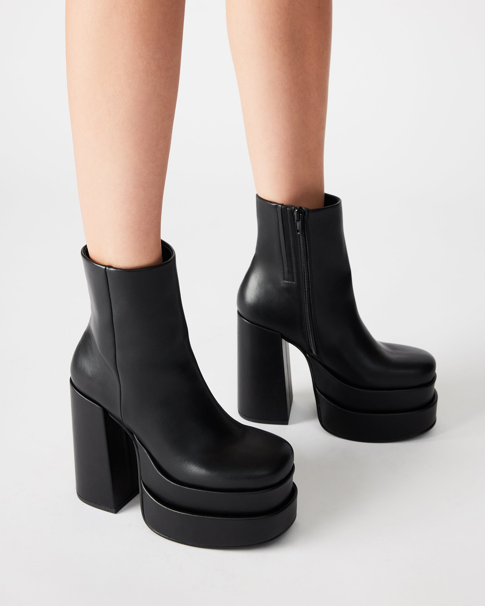 Side view of Cobra Black 70s style vegan leather platform boots with heavy heel