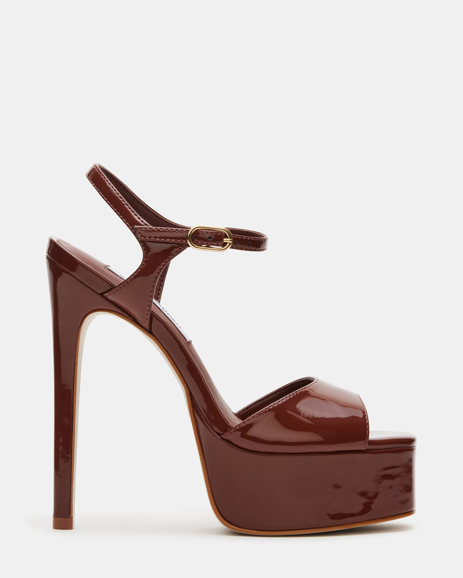 Side view of brown platform stiletto heels with a square toe.