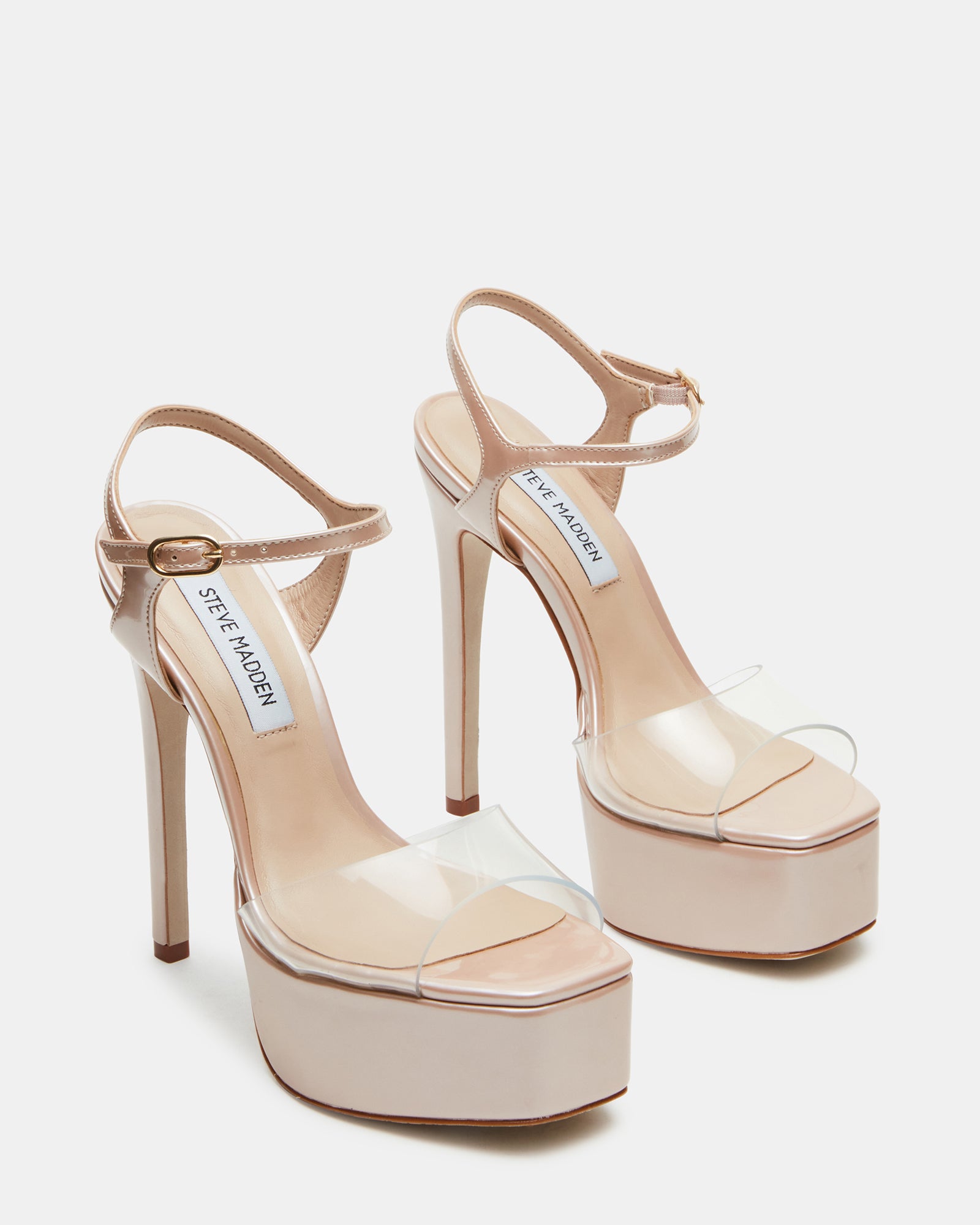 Close-up of black platform high heels highlighting square toe and texture