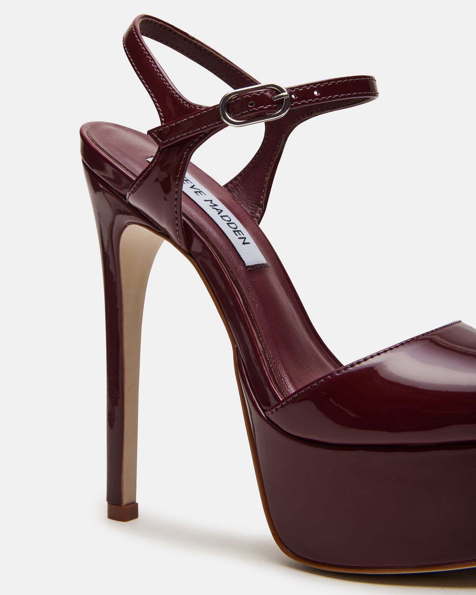 Cologne black platform stiletto heels from a side angle
