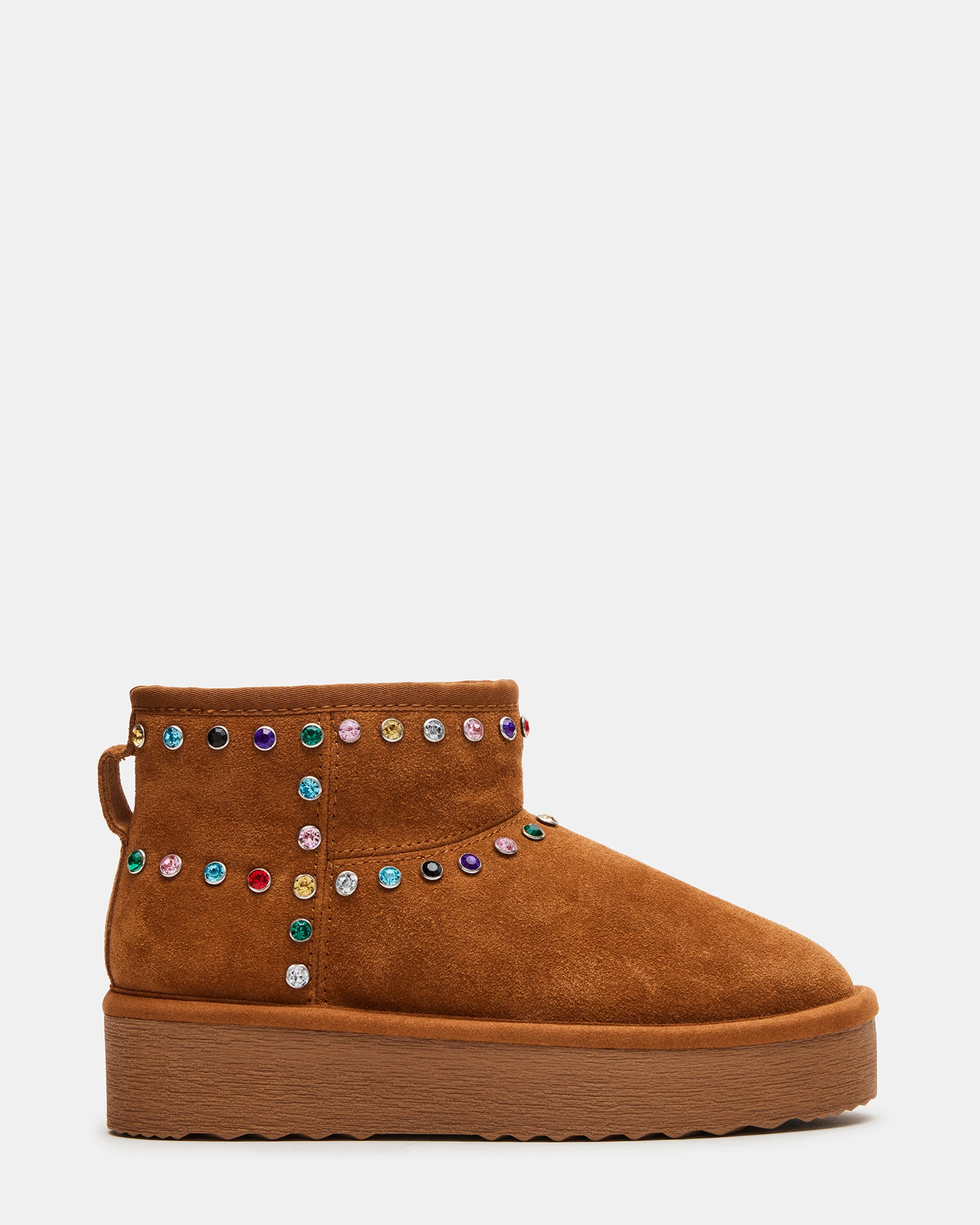 Brown platform boots with faux fur lining, styled with jeans