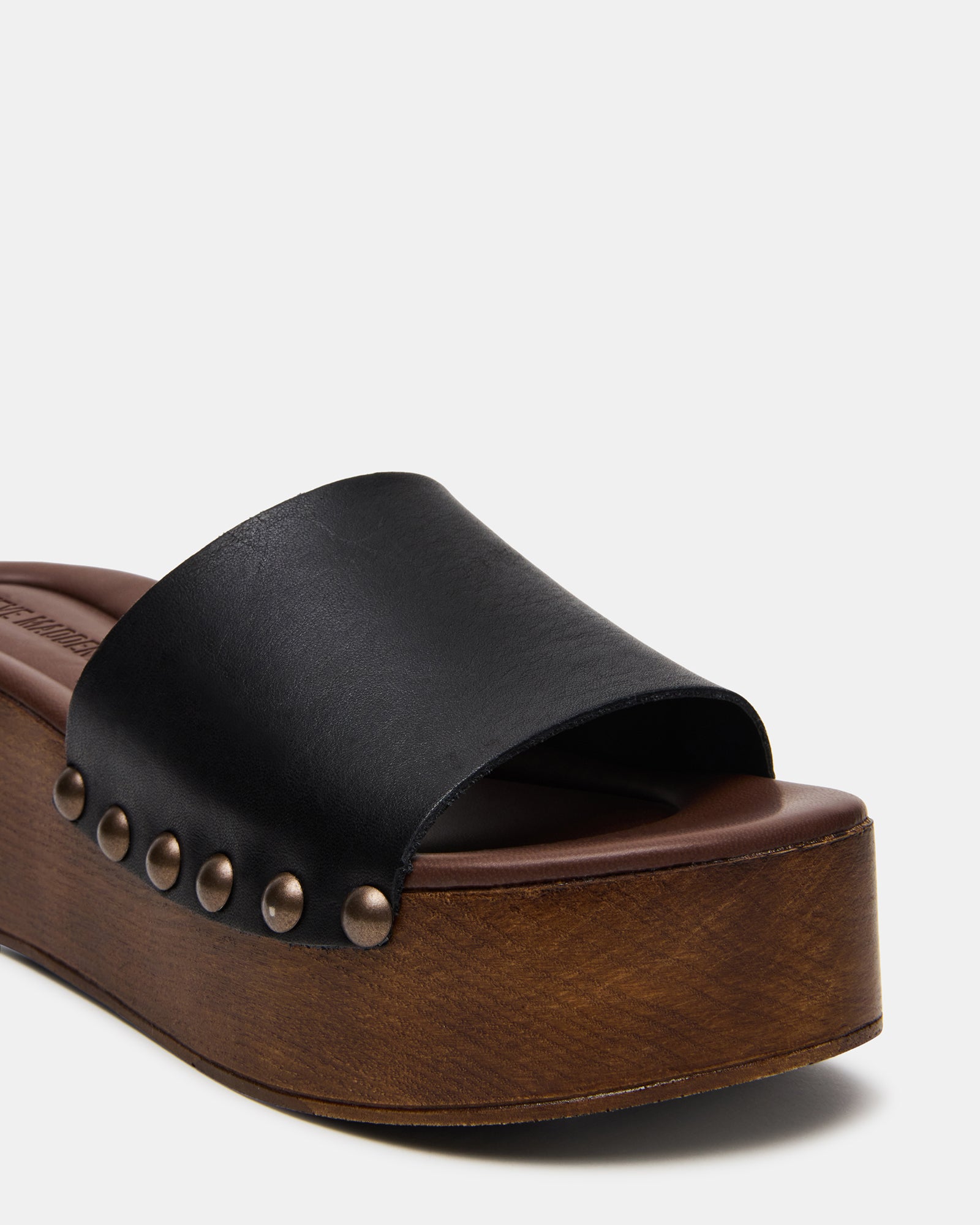 Close-up of heel and sole texture highlighting gucci-inspired platform silhouette