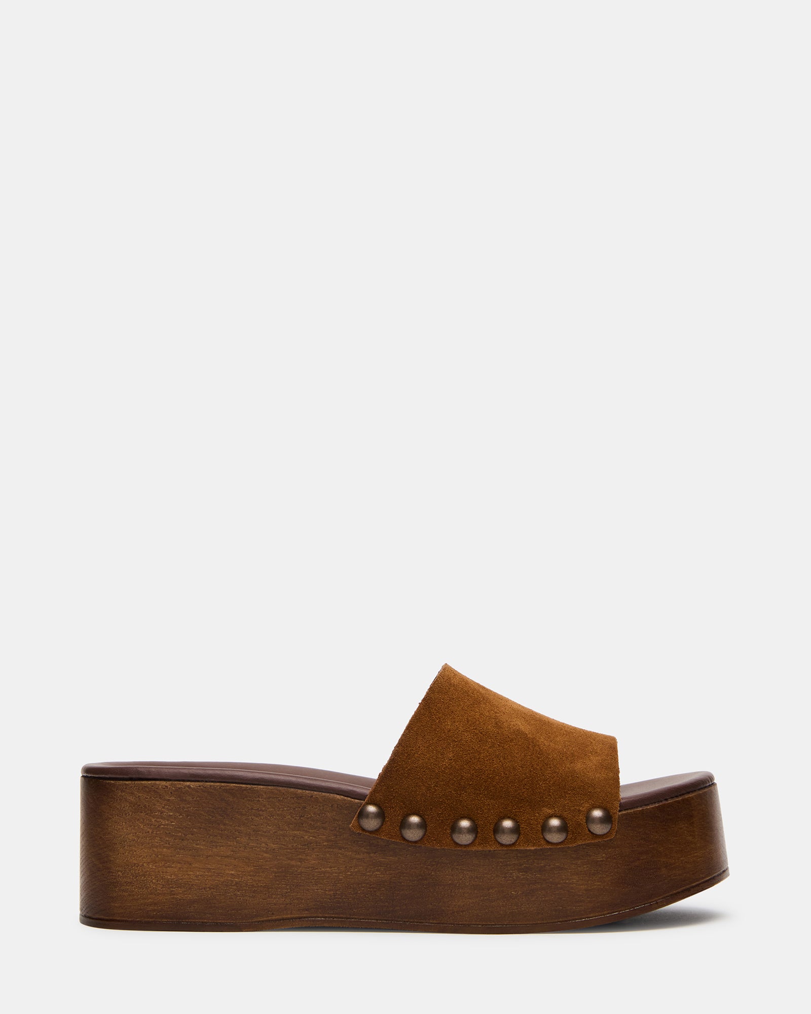 Close-up of tan suede platform sandals showcasing the wood bottom detail