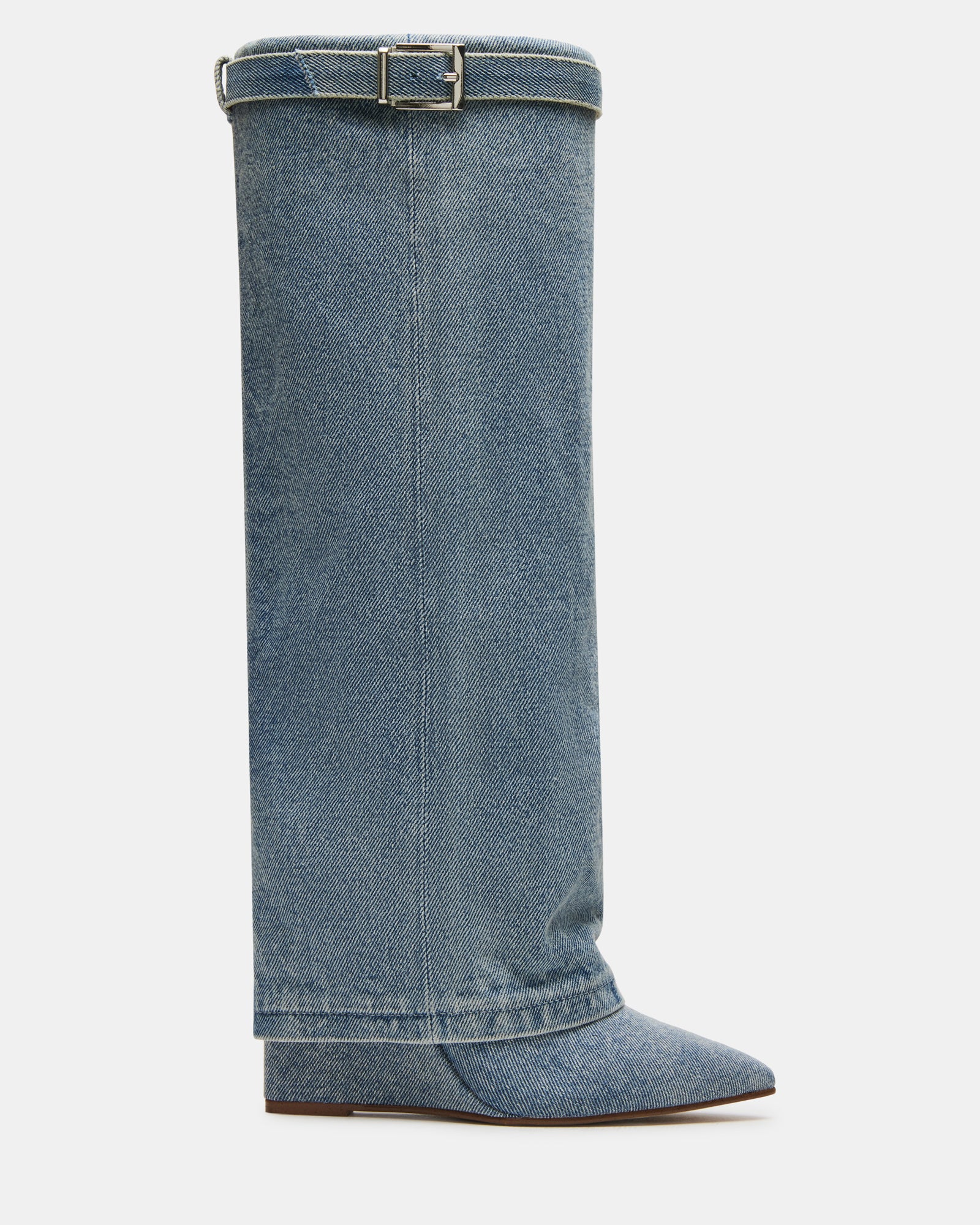 Close-up of CORENNE denim boot buckle and pointed toe